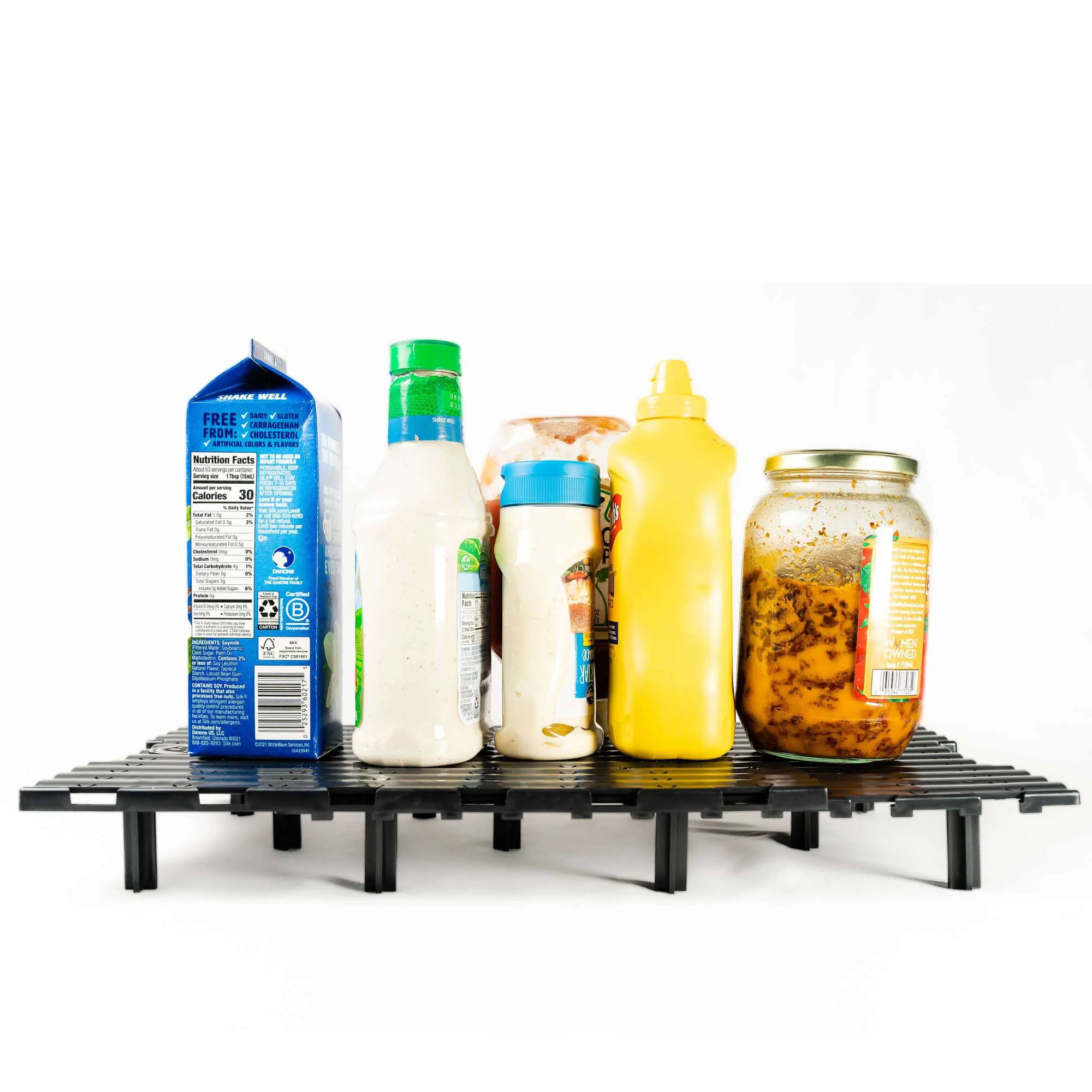 Sure, here is the corrected and grouped text from the image:

---

**Share Well**

**FREE FROM:**
- CHOLESTEROL
- LACTOSE
- GLUTEN

**Nutrition Facts**

**Calories** 30

**Total Fat** 0g

**Sodium** 10mg

**Total Carbohydrate** 7g

**Dietary Fiber** 0g

**Sugars** 7g

**Protein** 1g

**Vitamin D** 0mcg

**Calcium** 120mg

**Iron** 0mg

**Potassium** 150mg

**Vitamin C** 0mg

**Thiamin** 0mg

**Riboflavin** 0mg

**Niacin** 0mg

**Vitamin B6** 0mg

**Folate** 0mcg

**Vitamin B12** 1.2mcg

**Vitamin A** 0mcg

**Vitamin E** 0mg

**Vitamin K** 0mcg

**Cholesterol** 0mg

**Saturated Fat** 0