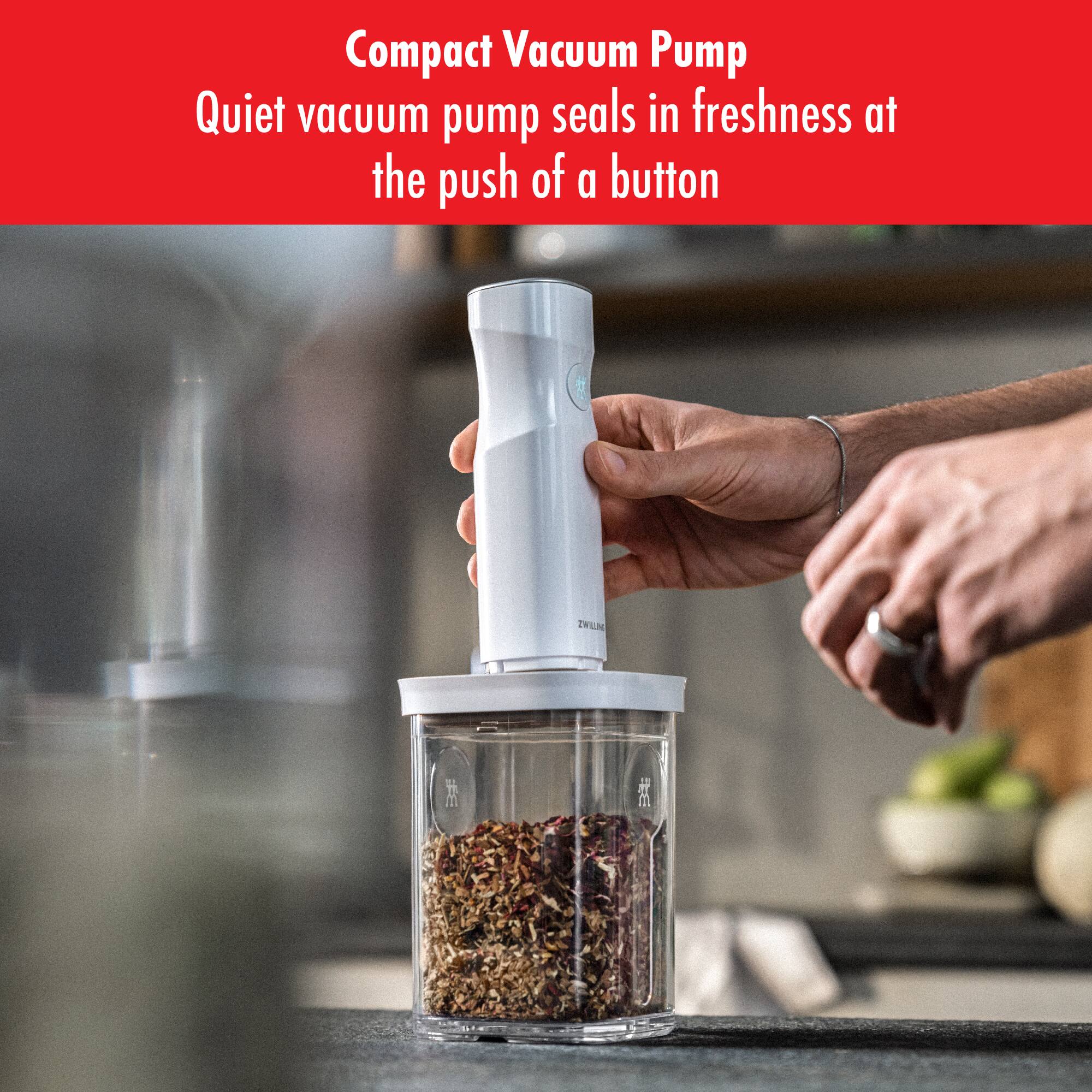 Compact Vacuum Pump  
Quiet vacuum pump seals in freshness at the push of a button