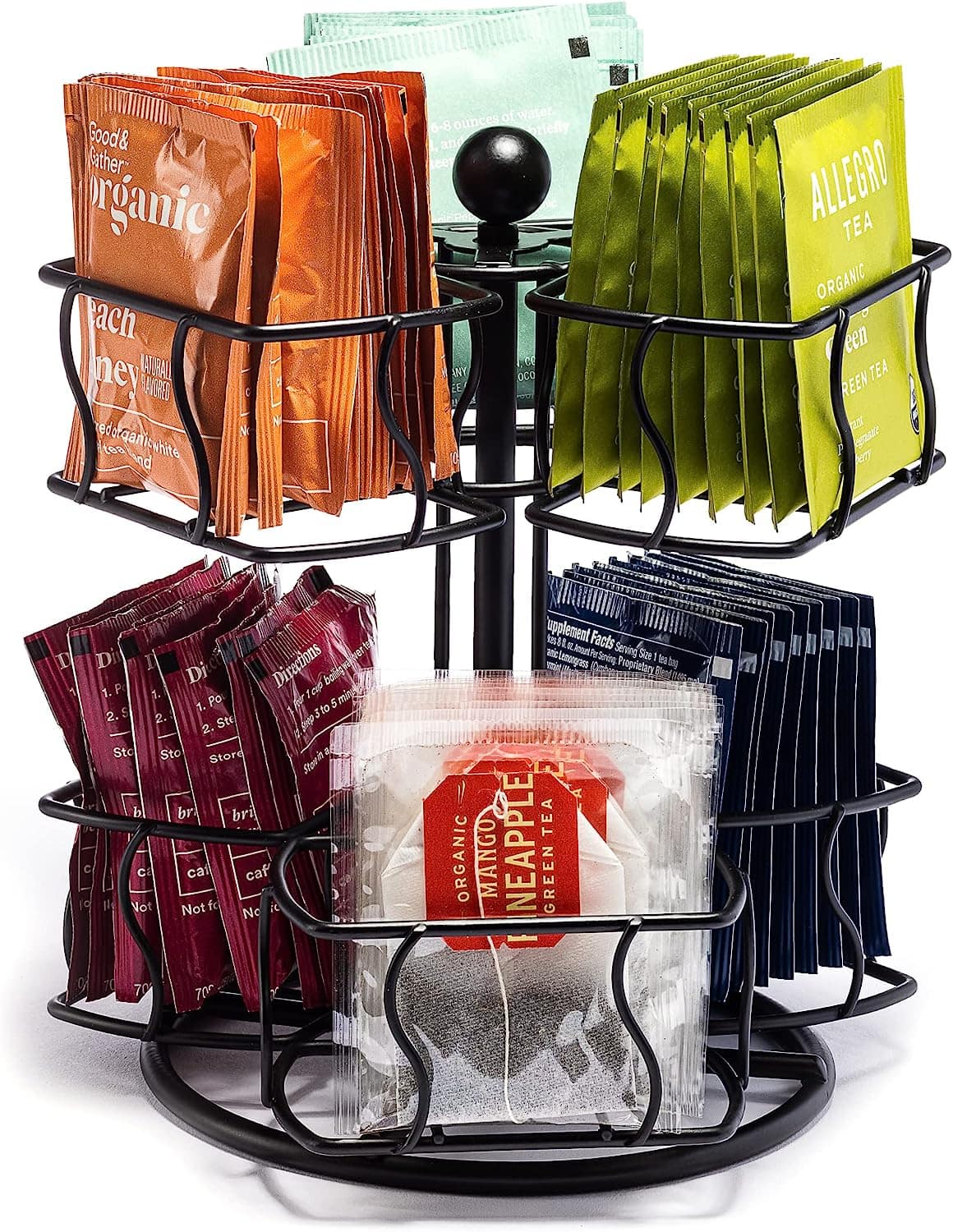 Sure, here is the corrected and grouped text from the image:

---

**Top Shelf:**
- Good & Gather Organic
- Each honey natural
- ed organic white tea
- 6-8 ounces of water. Steep briefly and enjoy.
- ALLEGRO TEA
- ORGANIC
- GREEN TEA

**Middle Shelf:**
- Directions
  1. Pour 1 cup of boiling water over 1 tea bag.
  2. Steep for 3-5 minutes.
  3. Remove tea bag.
- Supplement Facts
  Serving Size: 1 tea bag
  Calories: 0
  Total Fat: 0g
  Sodium: 0mg
  Total Carbohydrate: 0g
  Dietary Fiber: 0g
  Sugars: 0g
  Protein: 0g
  Not a significant source of any other nutrient.
- ORGANIC MANGO APPLE GREEN TEA

**Bottom Shelf:**
- Directions
  1. Pour 1 cup of boiling water over 1 tea bag.
  2. Steep for 3-5 minutes.
  3. Remove tea bag.
- Supplement Facts
  Serving Size: 