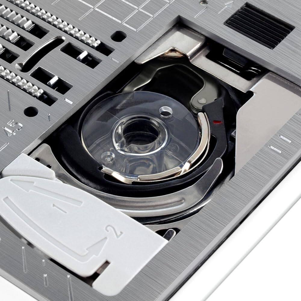 Left. Janome - Janome Horizon Memory Craft 9850 Embroidery and Sewing Machine - Includes Free Arm FA10a Hoop + Optic Magnifier + More - White/Purple.