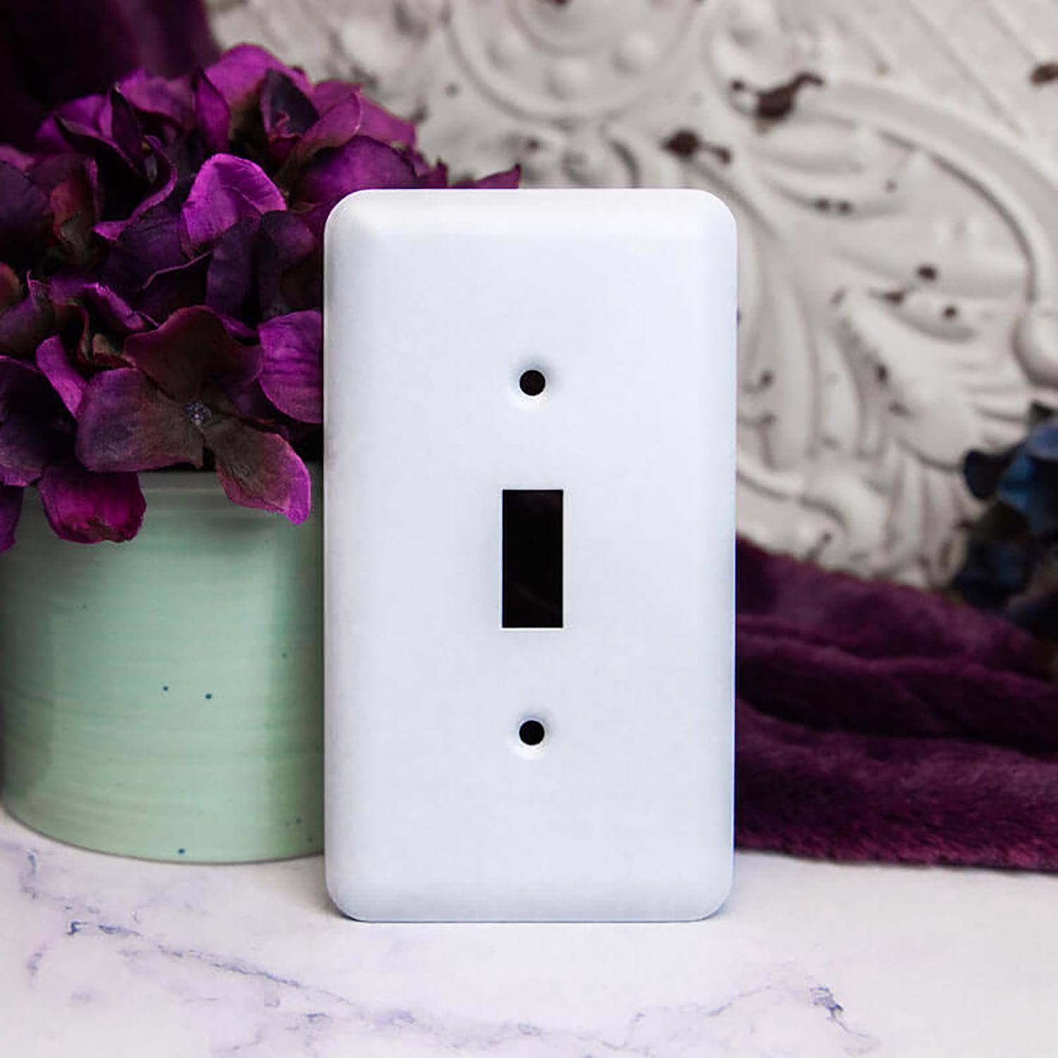 Left. AMERELLE - Amerelle Devon White 2 gang Stamped Steel Decorator Wall Plate 1 pk - White.