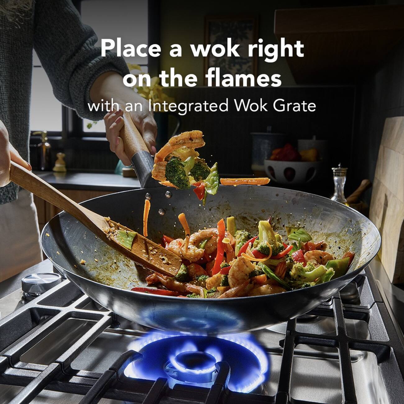 Place a wok right on the flames with an Integrated Wok Grate