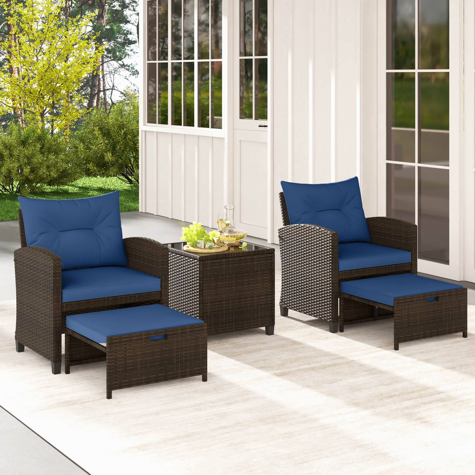 Alt View 3. Costway - 5 PCS Patio Rattan Furniture with 2 Wicker Ottomans & Tempered Glass Coffee Table - Navy + Mix Brown.