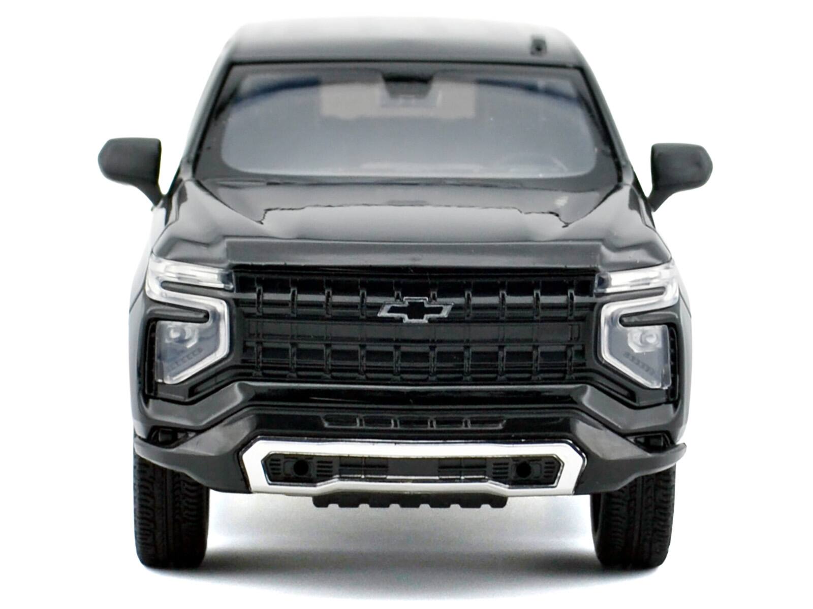 Alt View 3. Motormax - 2025 Chevrolet Tahoe PPV Black & White "Custom Builder's Kit" 1/24 Diecast Model Car by Motormax.