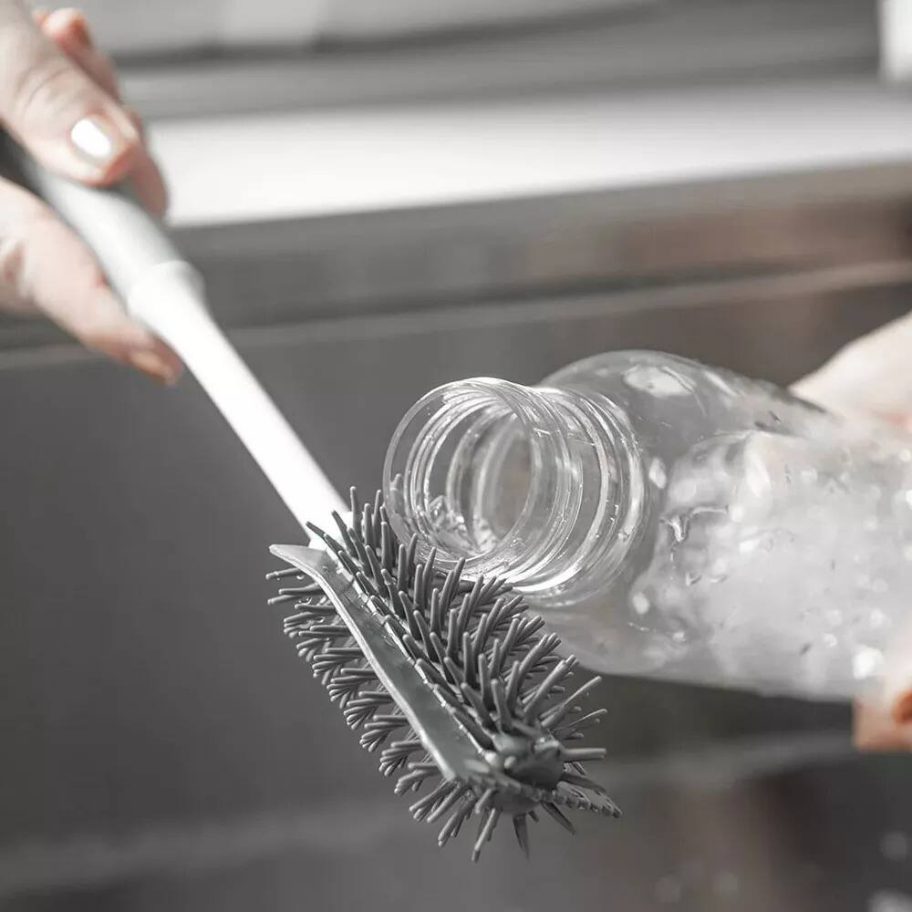 Left. OU - OU Bottle & Glass Brush – Ergonomic, Scratch Free, Deep Cleaning of Cups, Bottles & Glasses.