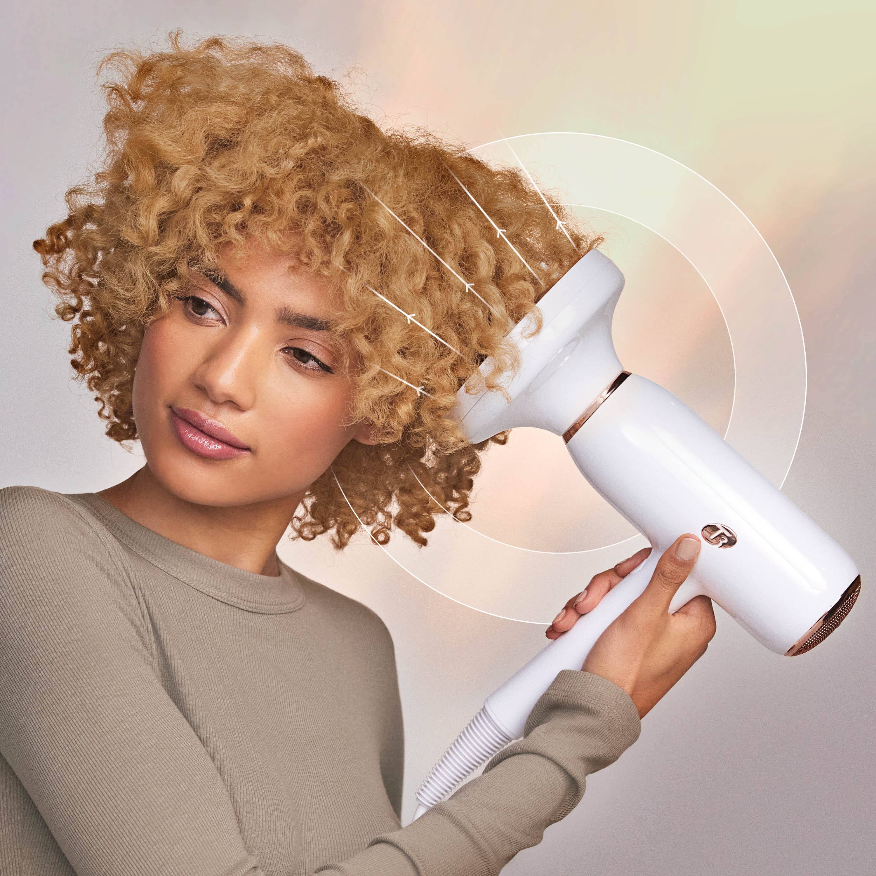 T3 featherweight folding hair dryer sold (white/rosegold) Dual voltage