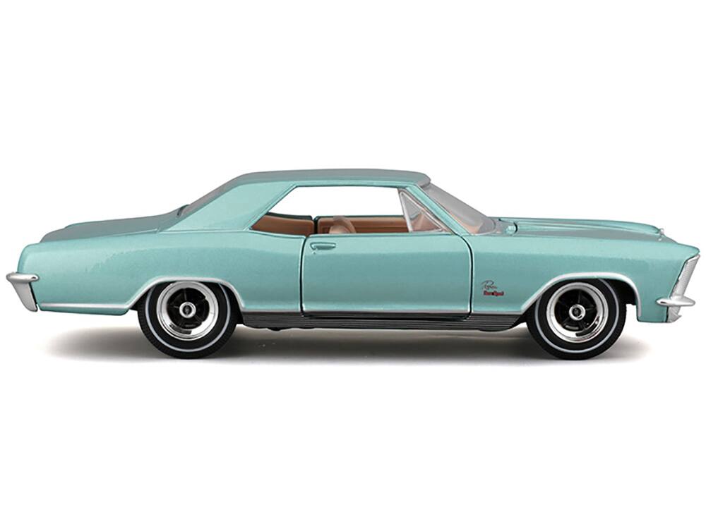 Left. Maisto - 1965 Buick Riviera Gran Sport Light Blue Metallic "Special Edition" Series 1/26 Diecast Model Car by Maisto - Light Blue Metallic.