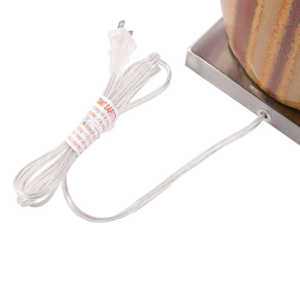 Sure, here is the corrected and grouped text from the image:

---

**TANT SAFETY**

**WARNING:**

**This product is not a plug.**

**Never use the plug if it is still plugged in.**

**PEP US 5**

---

This text appears to be a warning label on the product, emphasizing safety precautions.