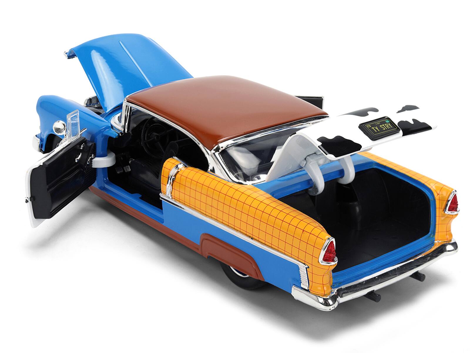 Alt View 4. Jada - 1955 Chevrolet Bel Air Blue with Graphics and Woody Diecast Figure "Toy Story" Franchise 1/24 Diecast Models by Jada.