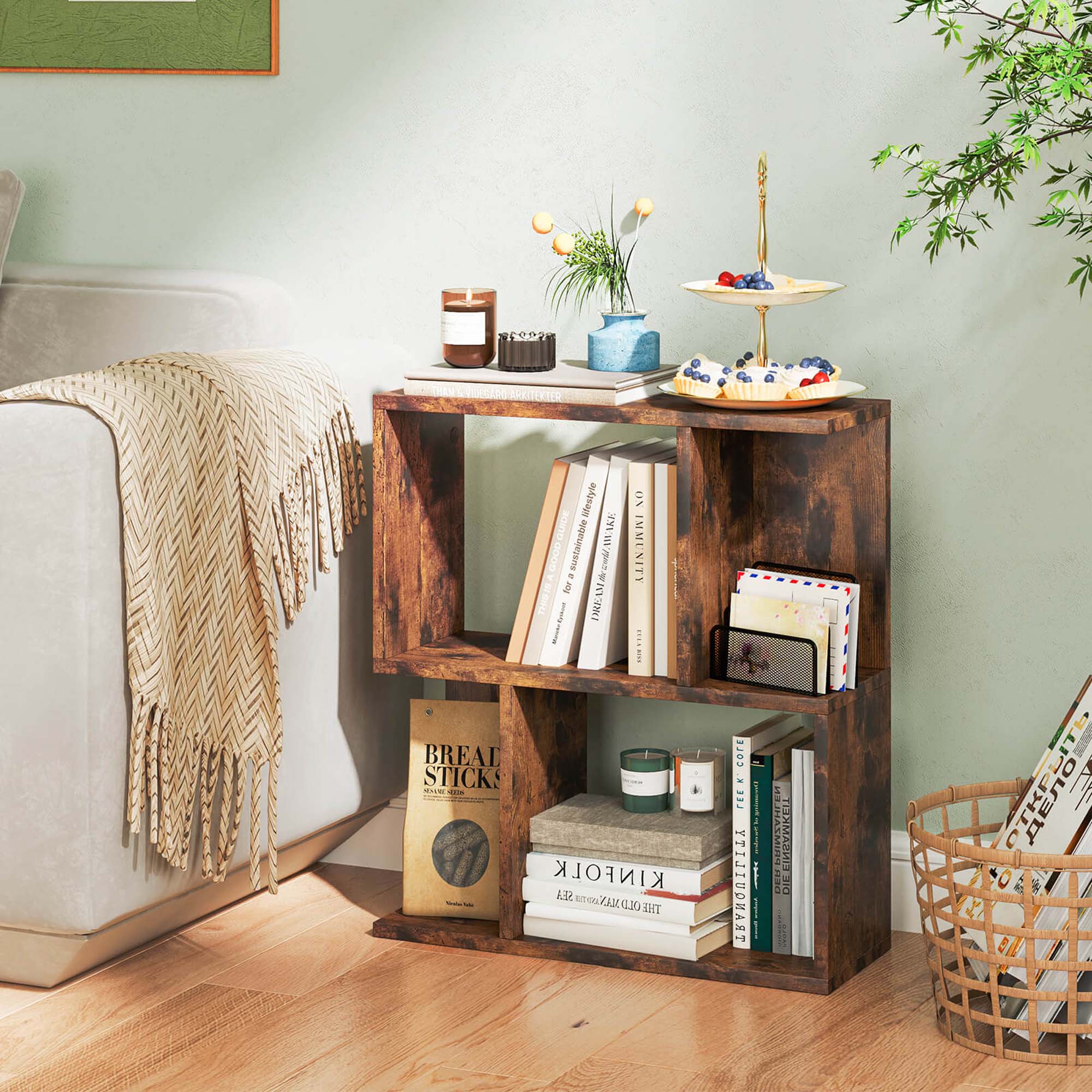 The image features a wooden bookshelf filled with various books, magazines, and decorative items. The bookshelf is placed on a wooden floor, and it has a cozy atmosphere. The books are arranged in different positions, and there are some magazines placed on the shelf as well. Additionally, there are a few decorative items such as a vase and a potted plant, which add to the overall aesthetic of the space. The combination of books, magazines, and decorative items creates a comfortable and inviting environment for reading and relaxation.