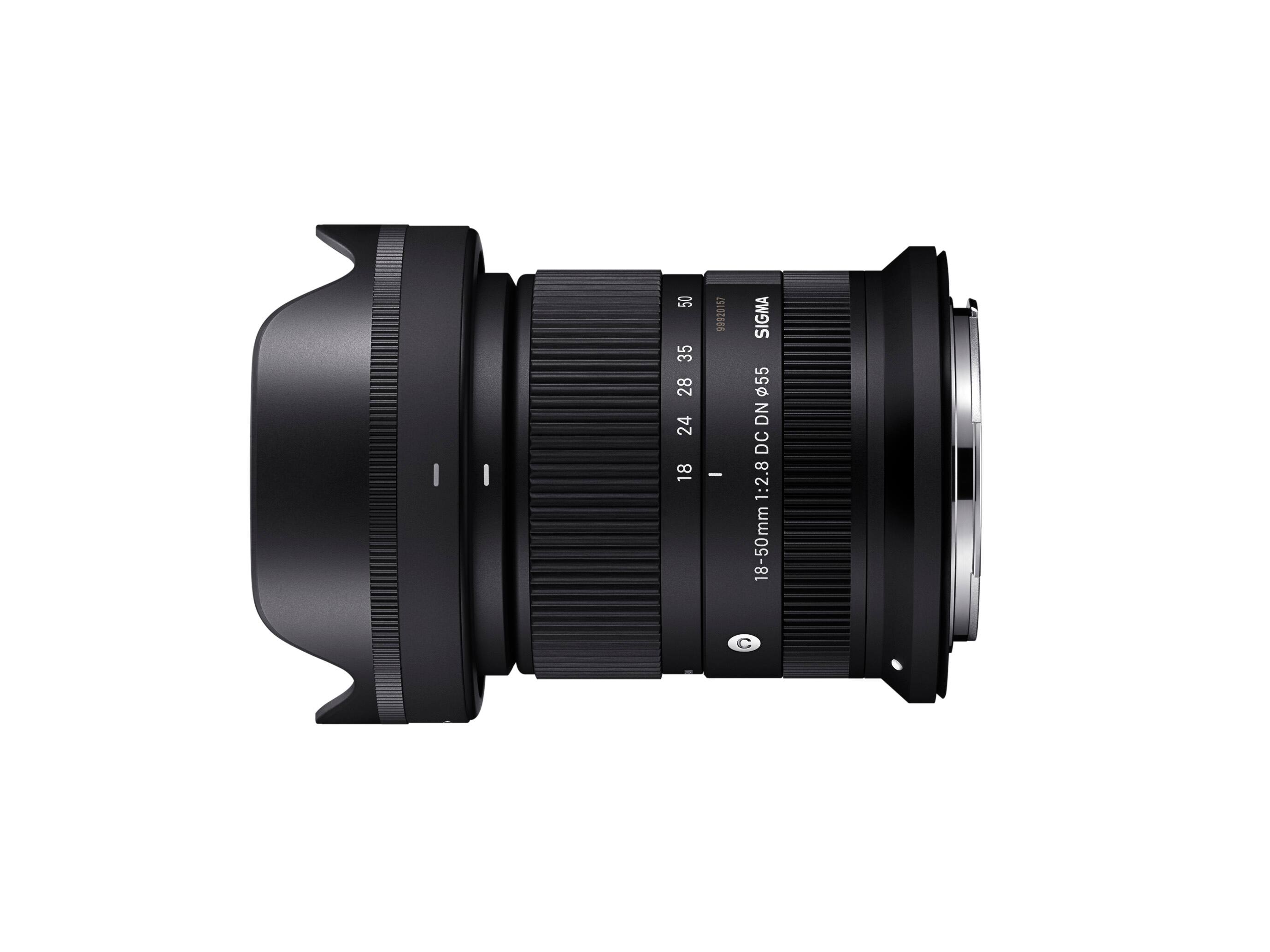 The text on the image reads "SIGMA 55 DN DC 1:2.8 18-50mm C."
