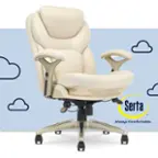 The image features a white Serta chair with a comfortable design. The chair is placed on a wheeled stand, allowing for easy movement and adjustment. The chair is accompanied by a cushion, providing additional comfort and support. The Serta brand is known for its high-quality, comfortable mattresses and furniture, ensuring that users have a pleasant and relaxing experience.
