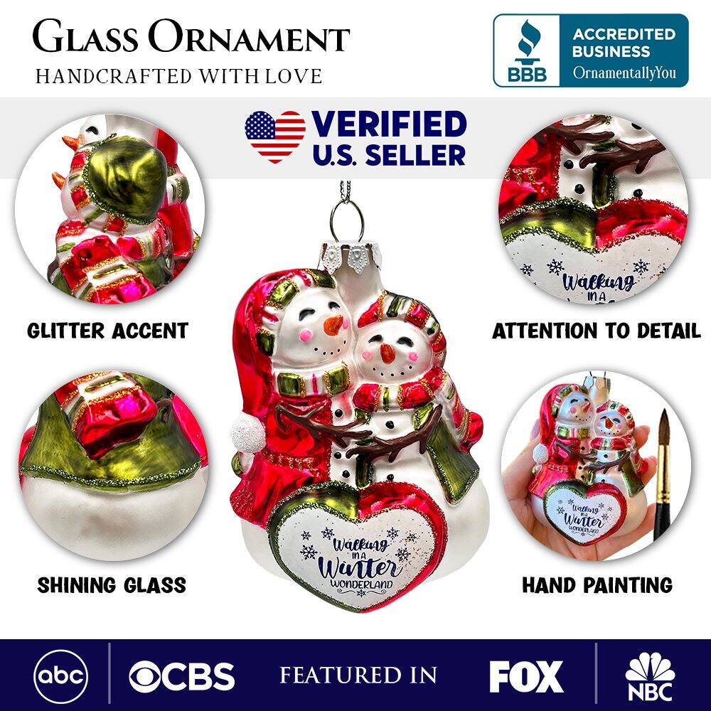 **GLASS ORNAMENT**  
HANDCRAFTED WITH LOVE  

**VERIFIED U.S. SELLER**  

- GLITTER ACCENT  
- SHINING GLASS  
- ATTENTION TO DETAIL  
- HAND PAINTING  

**ACCREDITED BUSINESS**  
OrnamentallyYou  

**FEATURED IN**  
abc | CBS | FOX | NBC  

**Walking in a Water Wonderland**
