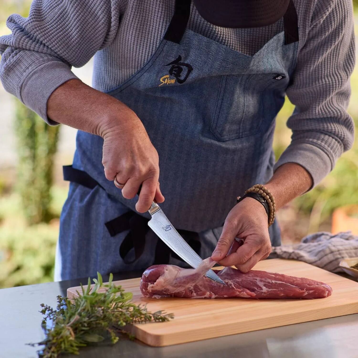 Left. Shun - Classic Gokujo Boning/Fillet Knife, 6 inch - Black.