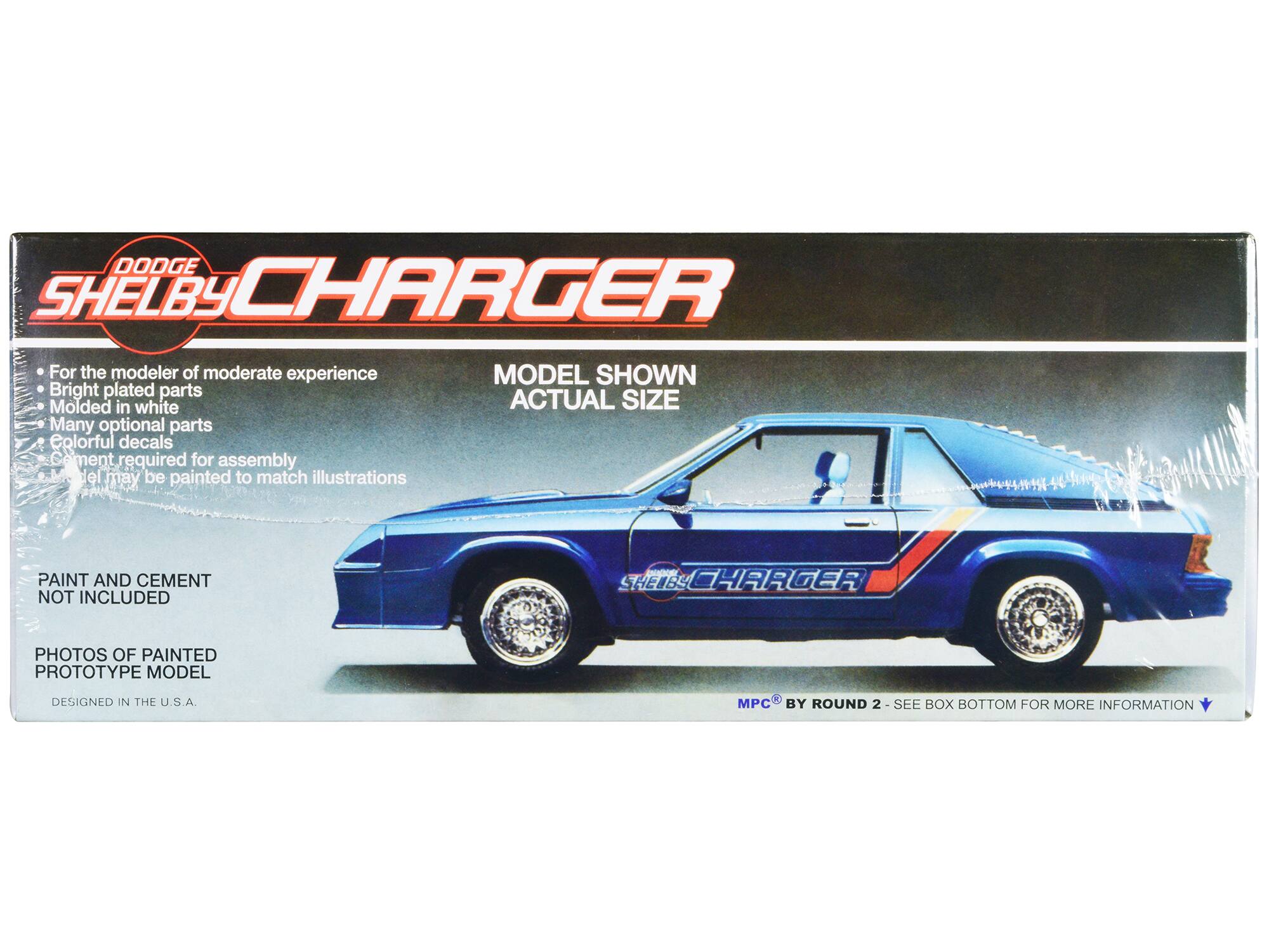 DODGE SHELBY CHARGER

For the modeler of moderate experience  
Bright plated parts  
Molded in white  
Many optional parts  
Colorful decals  
Cement required for assembly  
Model may be painted to match illustrations  

PAINT AND CEMENT NOT INCLUDED  

PHOTOS OF PAINTED PROTOTYPE MODEL  
DESIGNED IN THE U.S.A.  

MODEL SHOWN ACTUAL SIZE  

MPC BY ROUND 2  
SEE BOX BOTTOM FOR MORE INFORMATION