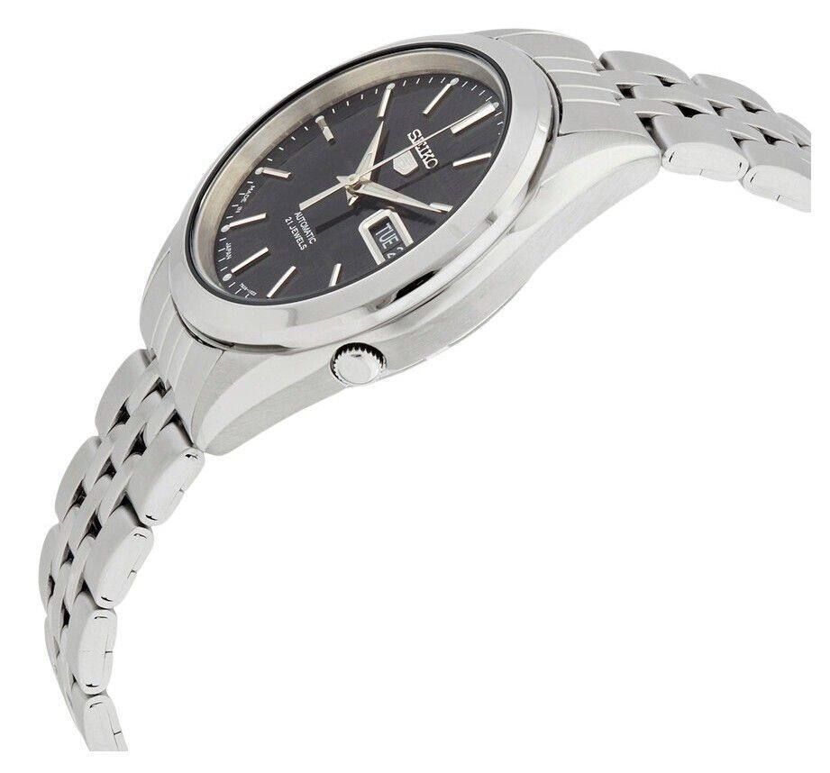 y  ser - ! 1 TT 21 JEWELS AUTOMATIC SEIKO TUE 7