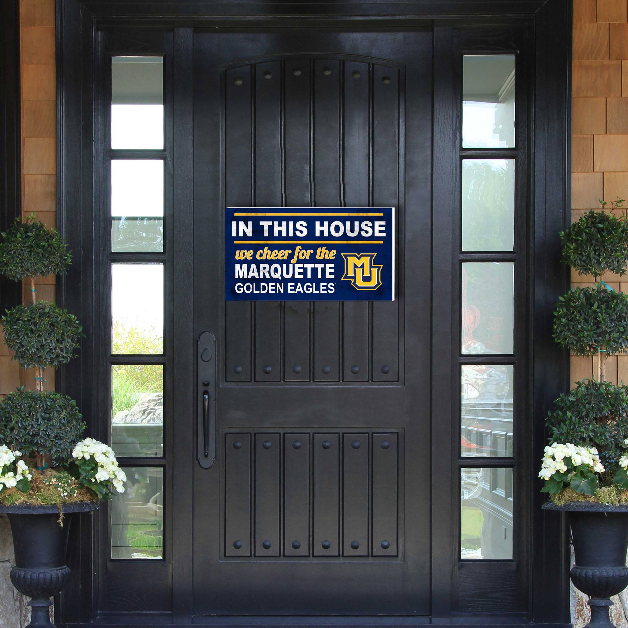 IN THIS HOUSE  
we cheer for the  
MARQUETTE  
GOLDEN EAGLES