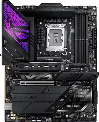 Republic of Gamers is a brand of computer hardware and accessories, including gaming laptops, monitors, and keyboards, produced by Asus. The image shows a close-up of a computer motherboard, which is a part of a computer system. The motherboard is a component that connects all the other components of the computer, such as the CPU, RAM, and storage devices. The image also features a monitor, which is an essential part of a computer setup for displaying images and text.