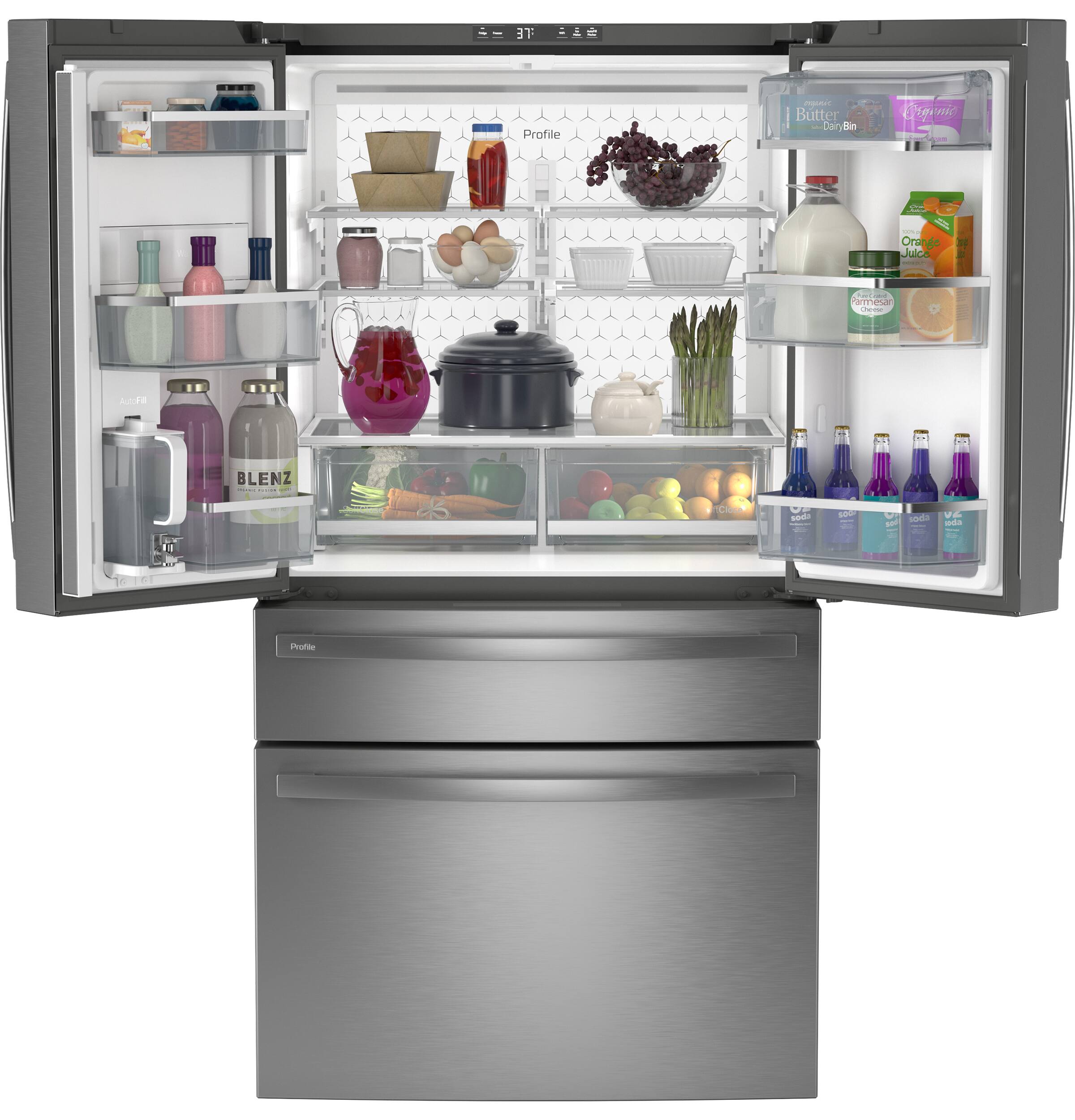 The image shows a refrigerator with its door open, revealing a well-stocked interior. The refrigerator contains a variety of food items, including several bottles, a bowl, and a vase. There are also multiple carrots placed in different areas of the refrigerator. The refrigerator is filled with a diverse assortment of food items, making it a well-stocked and functional appliance.