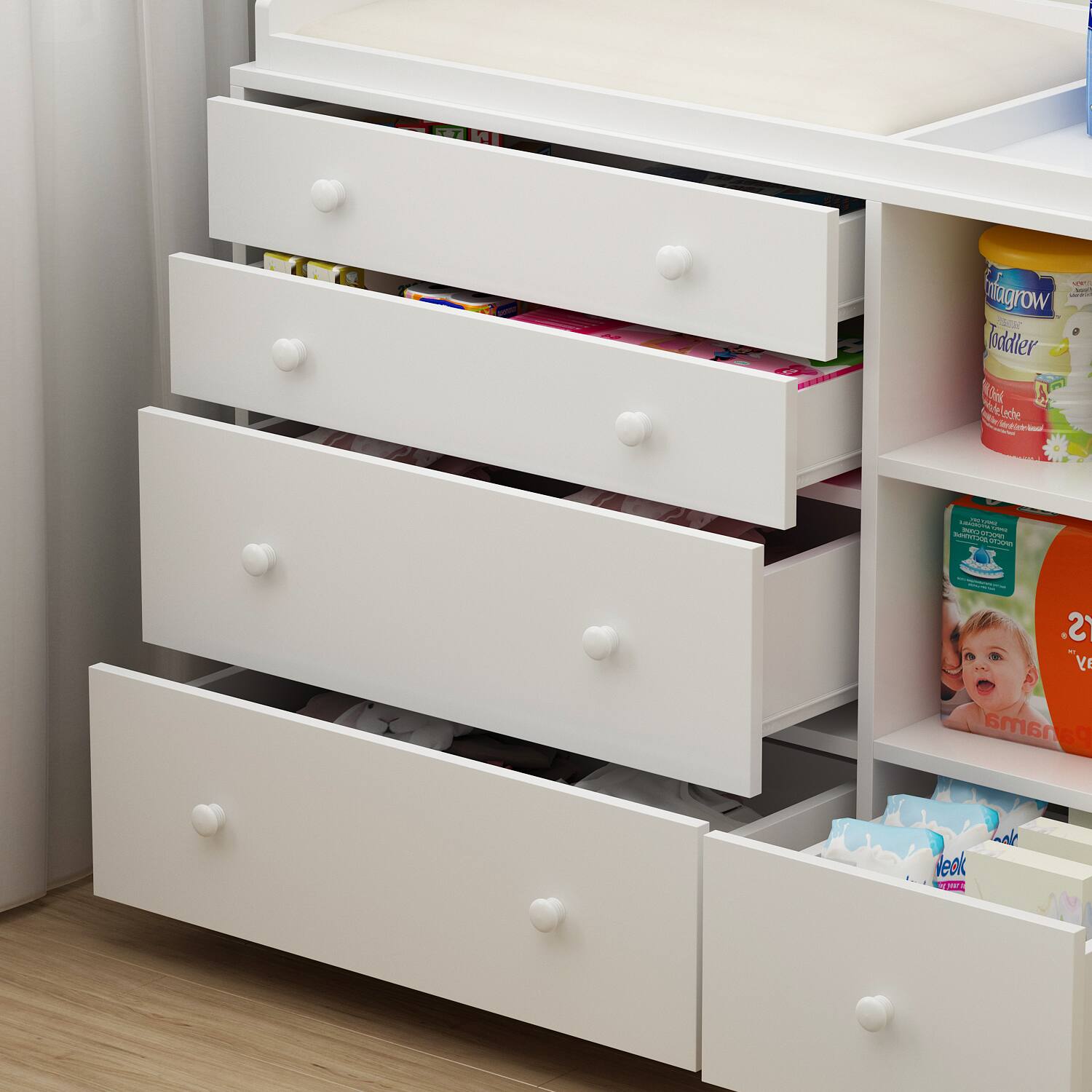 Sure, here is the corrected and grouped text from the image:

**Top Shelf:**
- Enfagrow Toddler
- A Natelache el acbe

**Middle Shelf:**
- 2+ years
- "ve"

**Bottom Shelf:**
- 6 months

**Drawer Labels:**
- (No visible text on the drawers)

**Additional Text:**
- (No additional visible text)