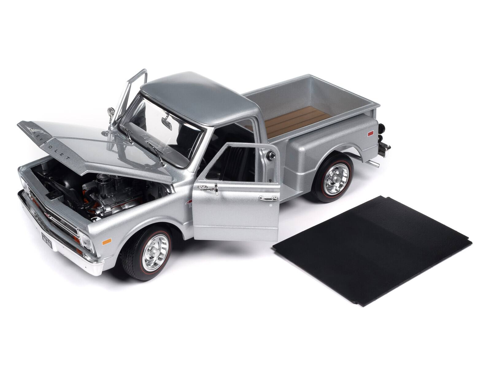 Angle. Autoworld - 1968 Chevrolet C10 Stepside Pickup Truck Silver Metallic 1/18 Diecast Model Car by Auto World - Silver Metallic.