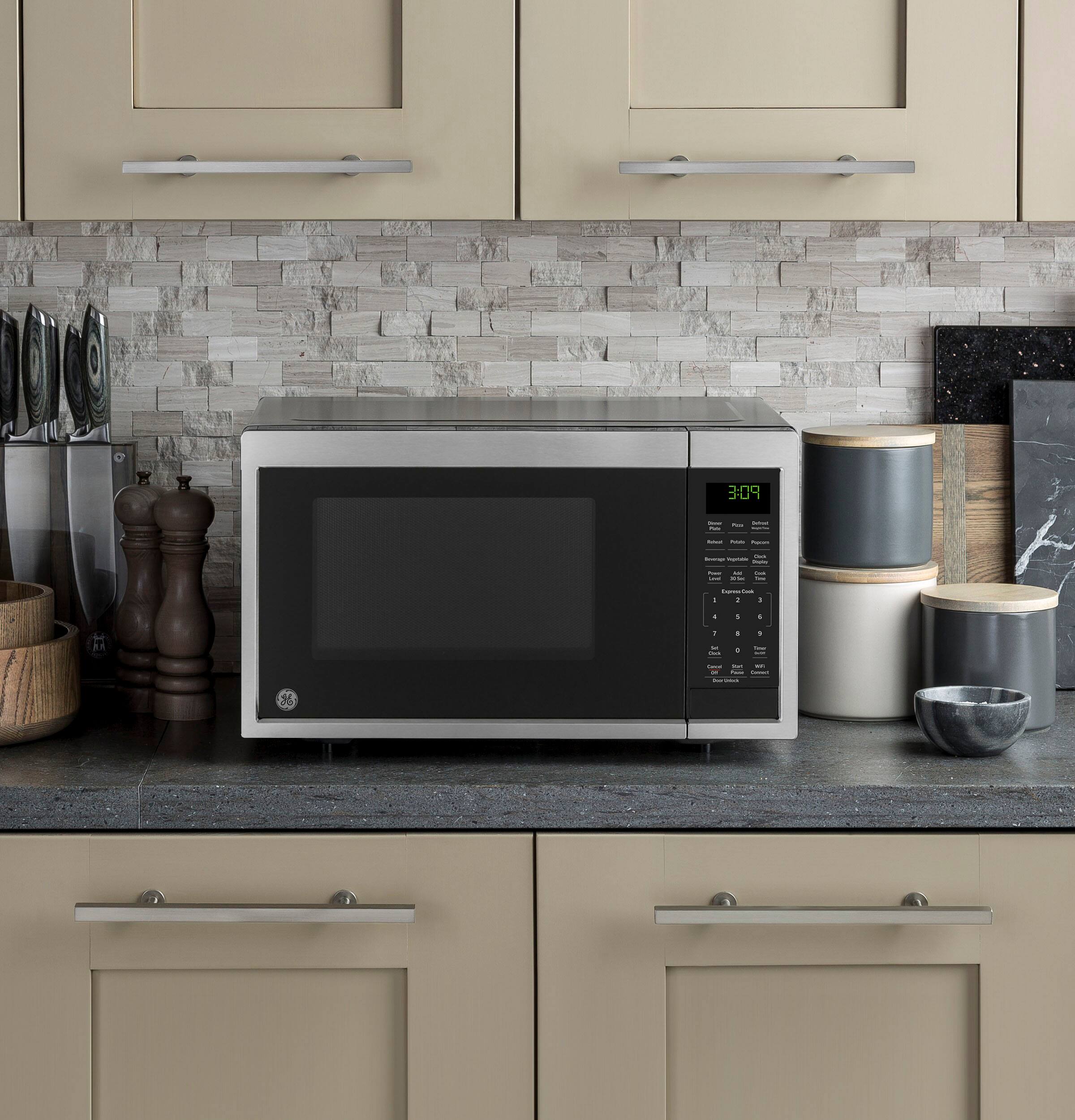 Alt View 28. GE - 0.9 Cu. Ft. Countertop Microwave with Scan-to-Cook Technology - Stainless Steel.