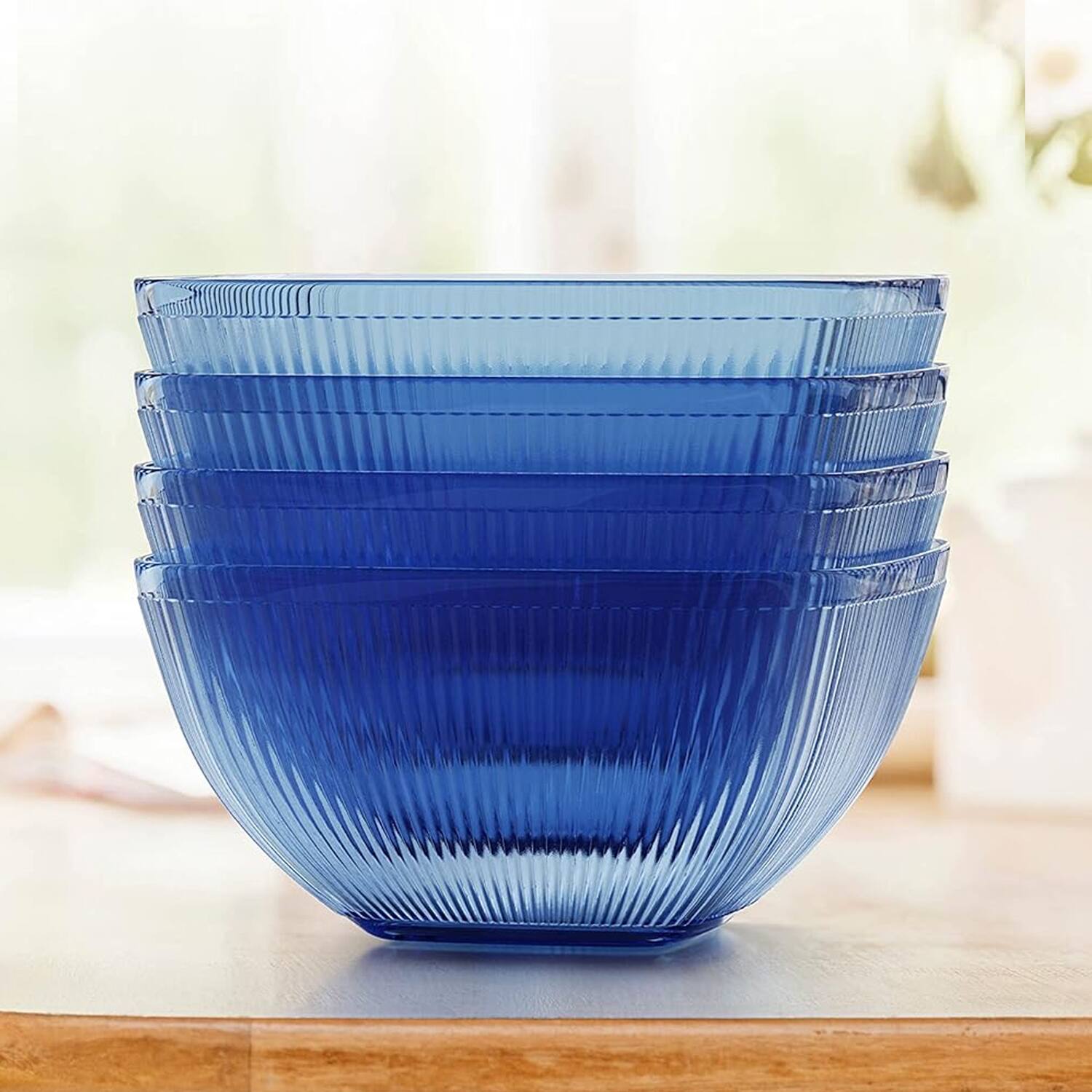 Left. Jay Import - Set of 4 Ribbed Blue Acrylic Bowls - Blue.