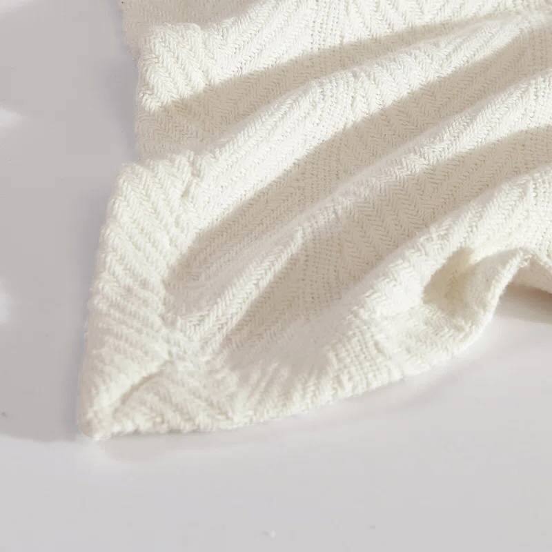 Left. Hivvago - King size Cream Bone Lightweight 100-Percent Cotton Blanket - Machine Washable - Cream.