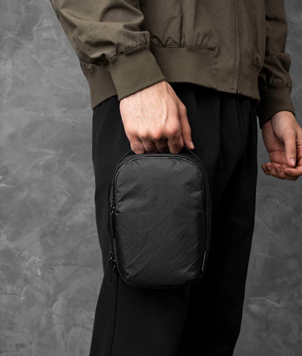 Left. ALPAKA - Metro Sling V2 1.5L Crossbody Sling Bag, Travel EDC Shoulder Bag, 6 Sleeves, YKK AquaGuard Zippers - Black Ultradyne 100D.