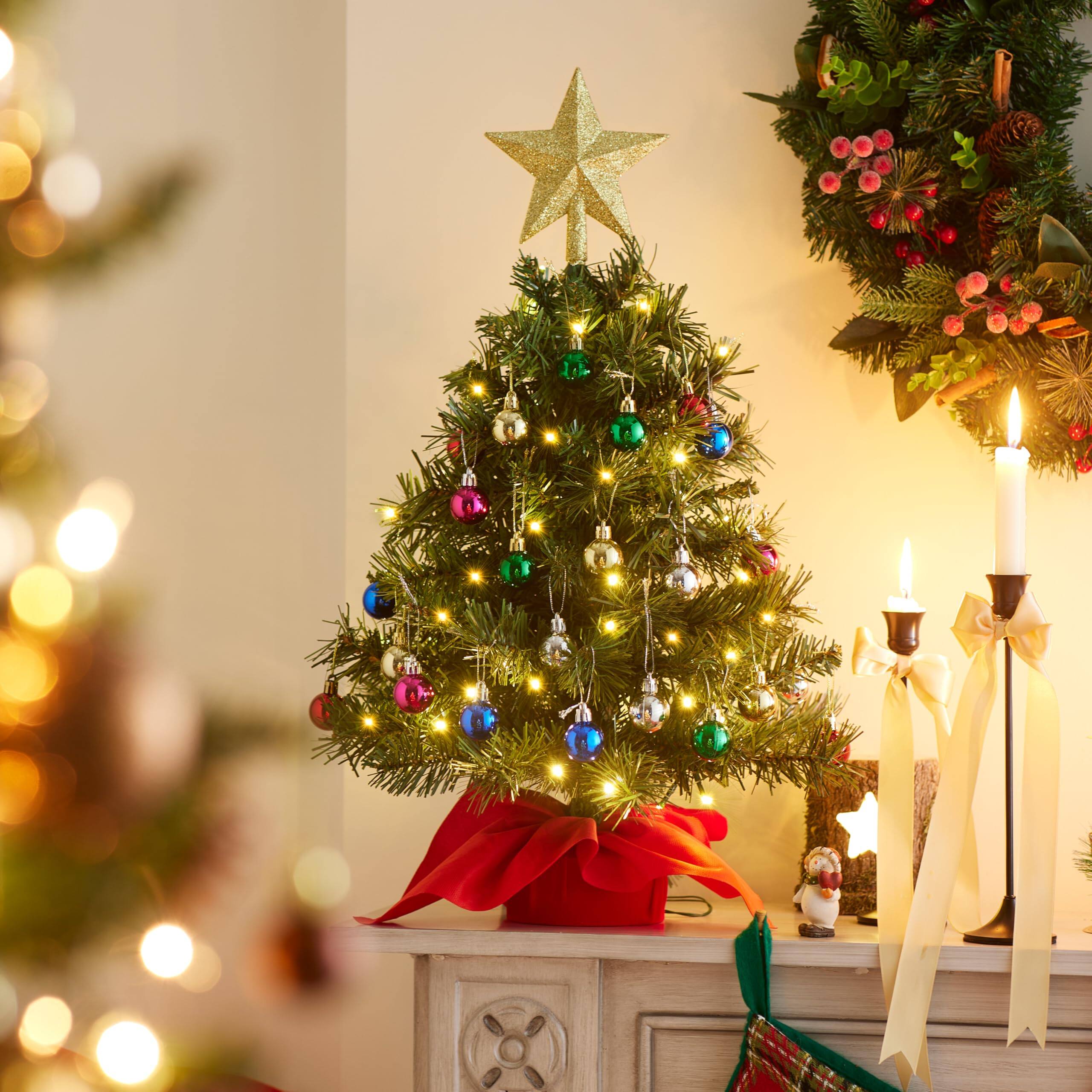 Alt View 2. Stylel Star - Joiedomi 24"/2FT Mini Christmas Tree Tabletop Set with Clear LED Lights, Artificial Mini Christmas Tree with Star... - Tree with red Tree Topper.