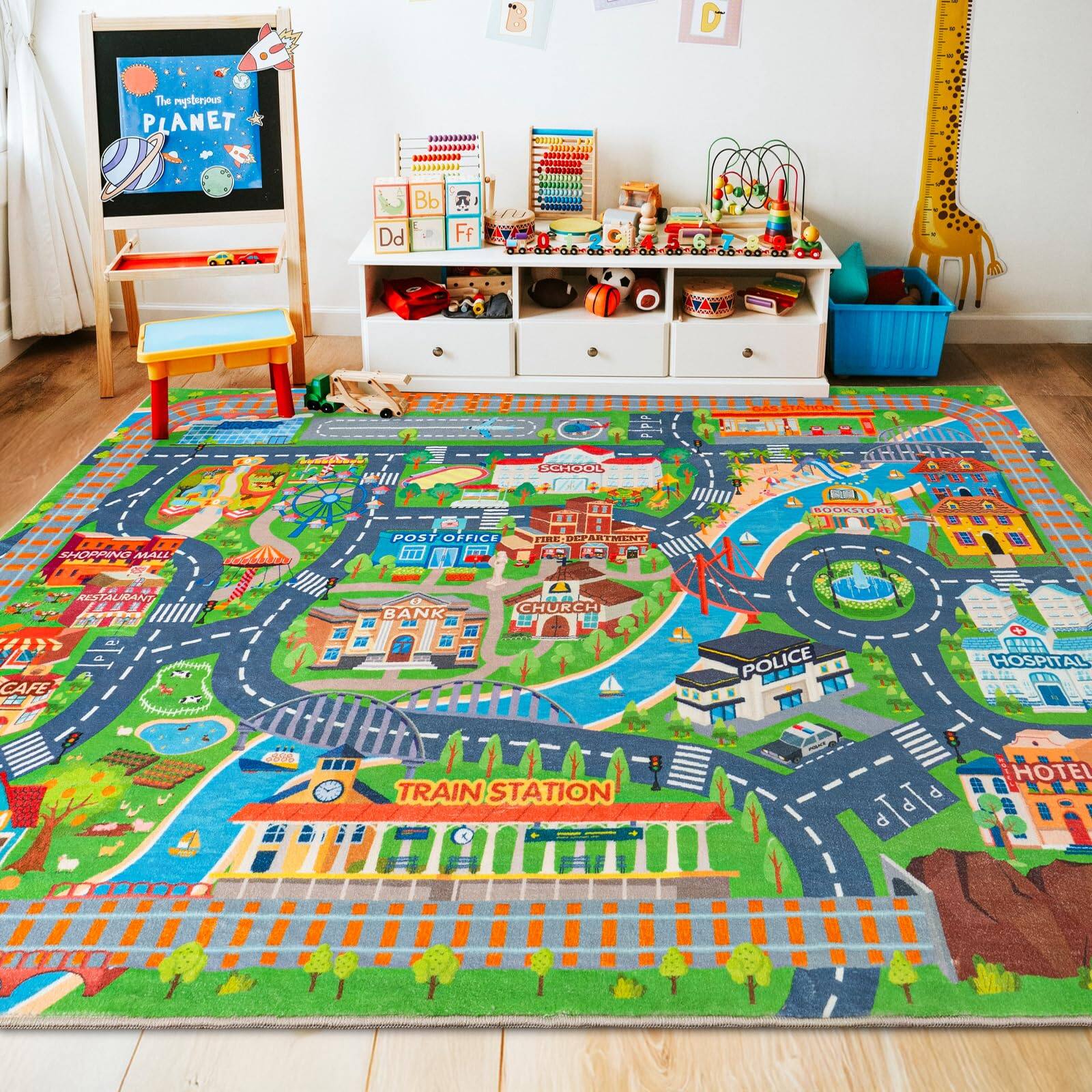 Sure, here is the corrected and grouped text from the image:

---

**The magnificent PLANET**

**Bb Dd Ff**

**POST OFFICE**

**SHOPPING MALL**

**RESTAURANT**

**CAFE**

**BANK**

**CHURCH**

**POLICE**

**HOSPITAL**

**TRAIN STATION**

**HOTEL**

---

This text appears to be part of a child's play area, with educational elements and a play mat depicting various locations.