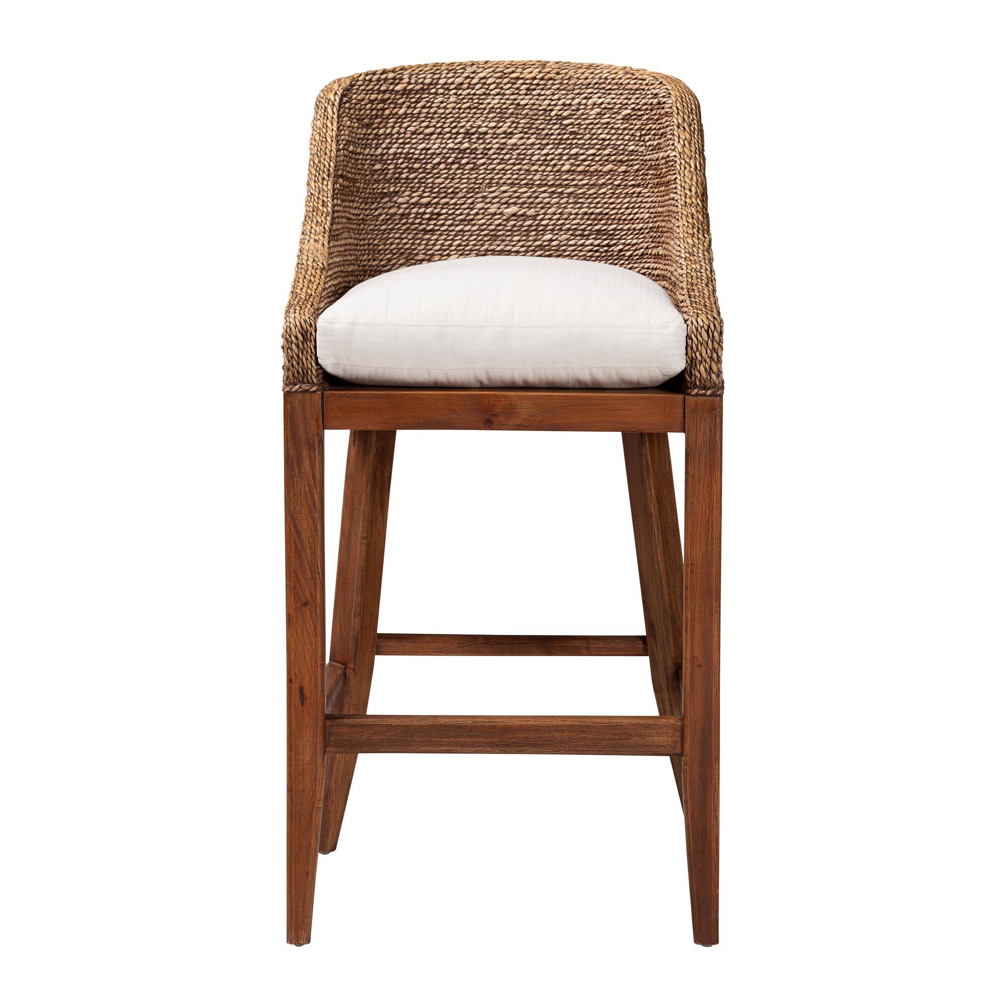 Angle. bali & pari - Jasper Seagrass Bar Stool with Mahogany Wood Frame - Seating with Woven Wingback and Cushioned Seat - Brown Wash.