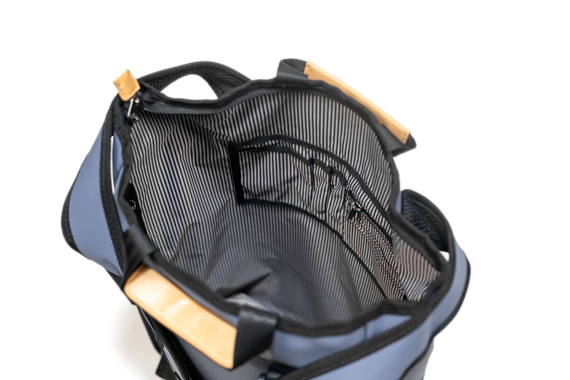 Left. PKG - Liberty Recycled Tote Backpack - Vintage Blue.