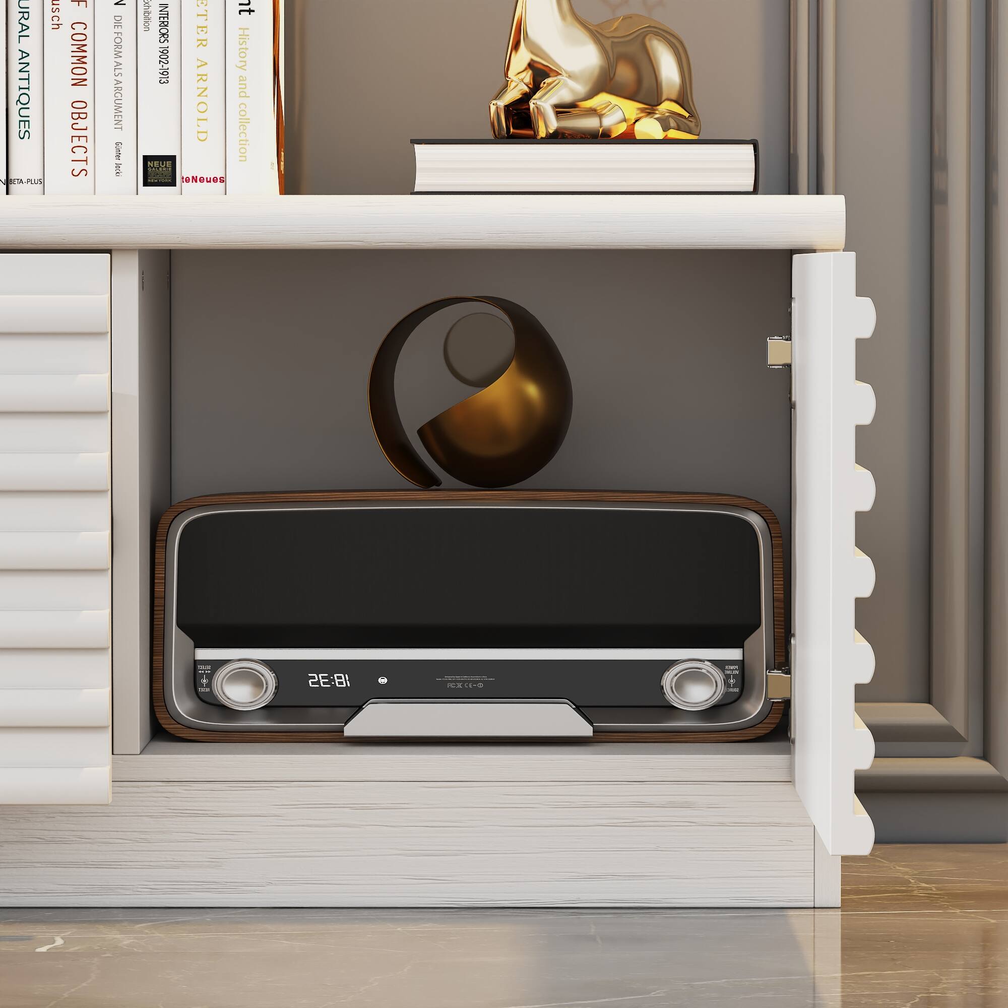 The text on the image reads: "FURAL usch COMMON ANTIQUES OBJECTS ETAPLSS - DIE FORM ALS ARGUMENT I I xhibition t INTERIORS ETER 1902-1913 History and ARNOLD collection MEKE | teNeues 18:35 - 15." This text is likely related to the books on the shelf and may provide information about the history or context of the displayed items.