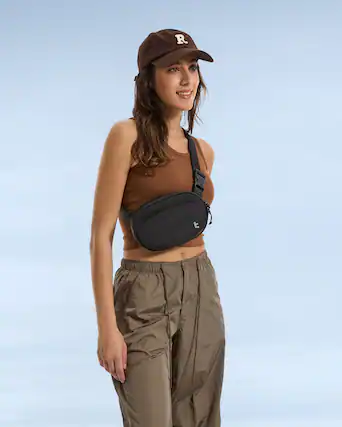 Front. tomtoc - SlingBean-T32 1.5L Sling Bag with RFID Blocking, Belt Bag Fanny Pack Waist Bag Crossbody Bag for Travel, Everyday - Black.