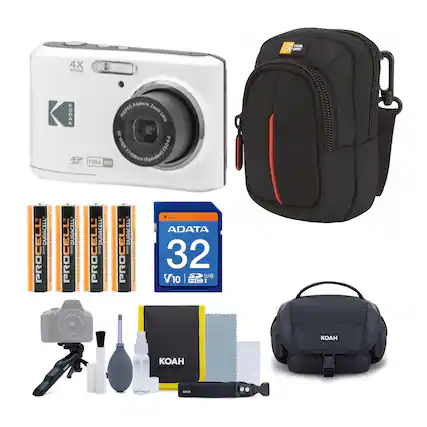 The image features a white camera and a black bag, along with various accessories and items. These include a Kodak camera, a bag, a lens, a memory card, a microSD card, batteries, and a strap. The items are arranged in a way that showcases the different components of the camera setup.