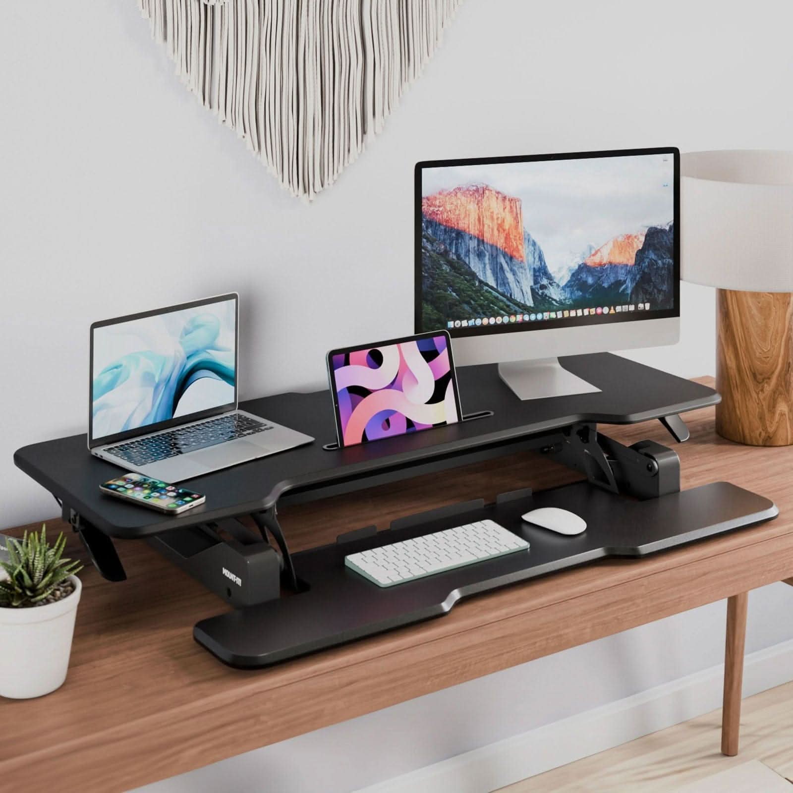 Angle. Mount-It! - Large Standing Desk Converter with 47″ Wide Desktop and Gas Spring Adjustable Sit‑Stand Workstation, Black - Black.
