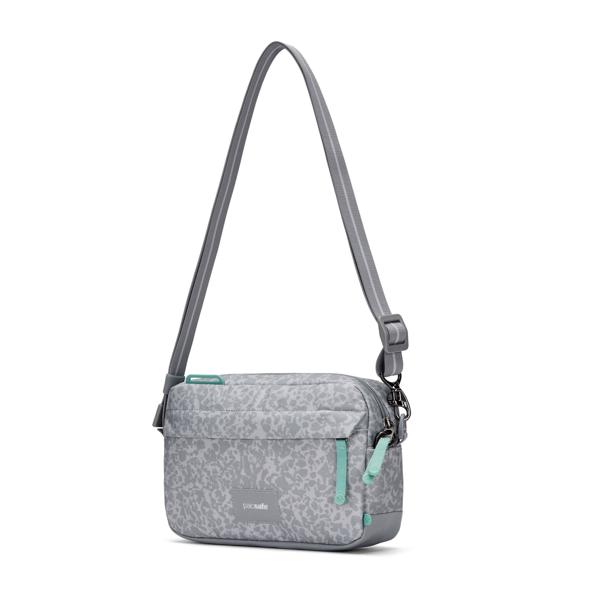 Left. Pacsafe - GO Anti Theft 2.5L Crossbody - Meteor Ice.