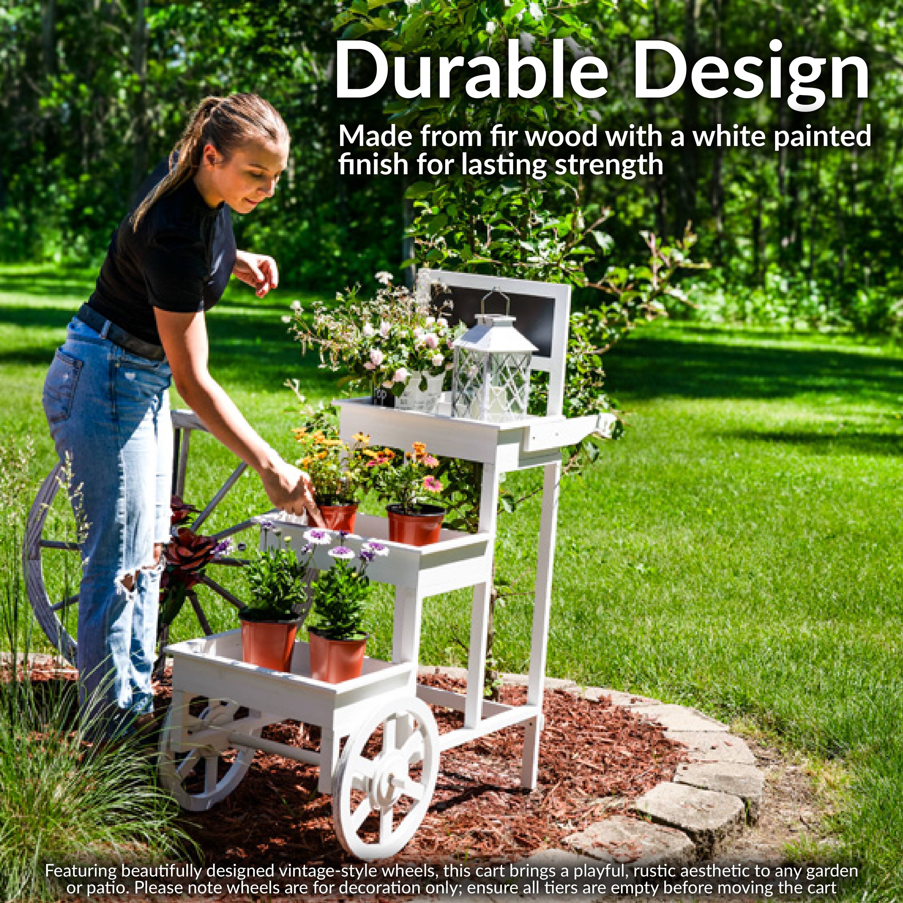 Durable Design  
Made from fir wood with a white painted finish for lasting strength  

Featuring beautifully designed vintage-style wheels, this cart brings a playful, rustic aesthetic to any garden or patio. Please note wheels are for decoration only; ensure all tiers are empty before moving the cart.