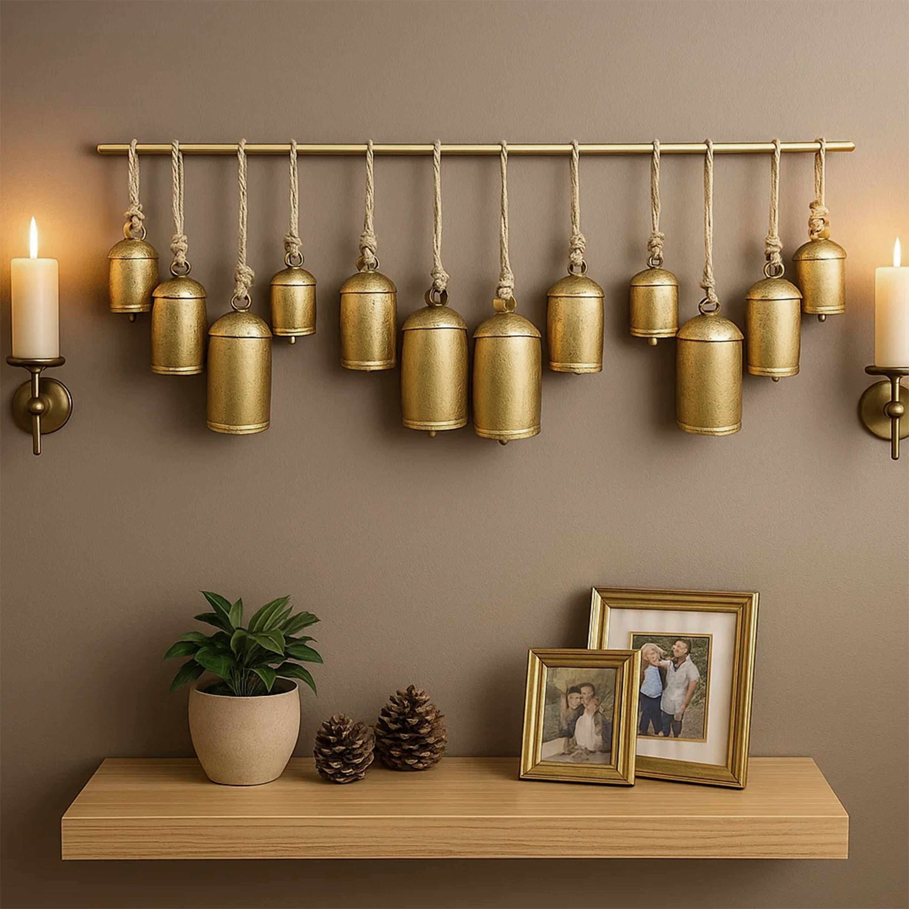 Alt View 8. Manhattan Lane - Neyra Iron Cow Bells Wall Decor 48 Inch Wide Decorative, Antique Gold Finish, Jute Hanging Rope - Gold.