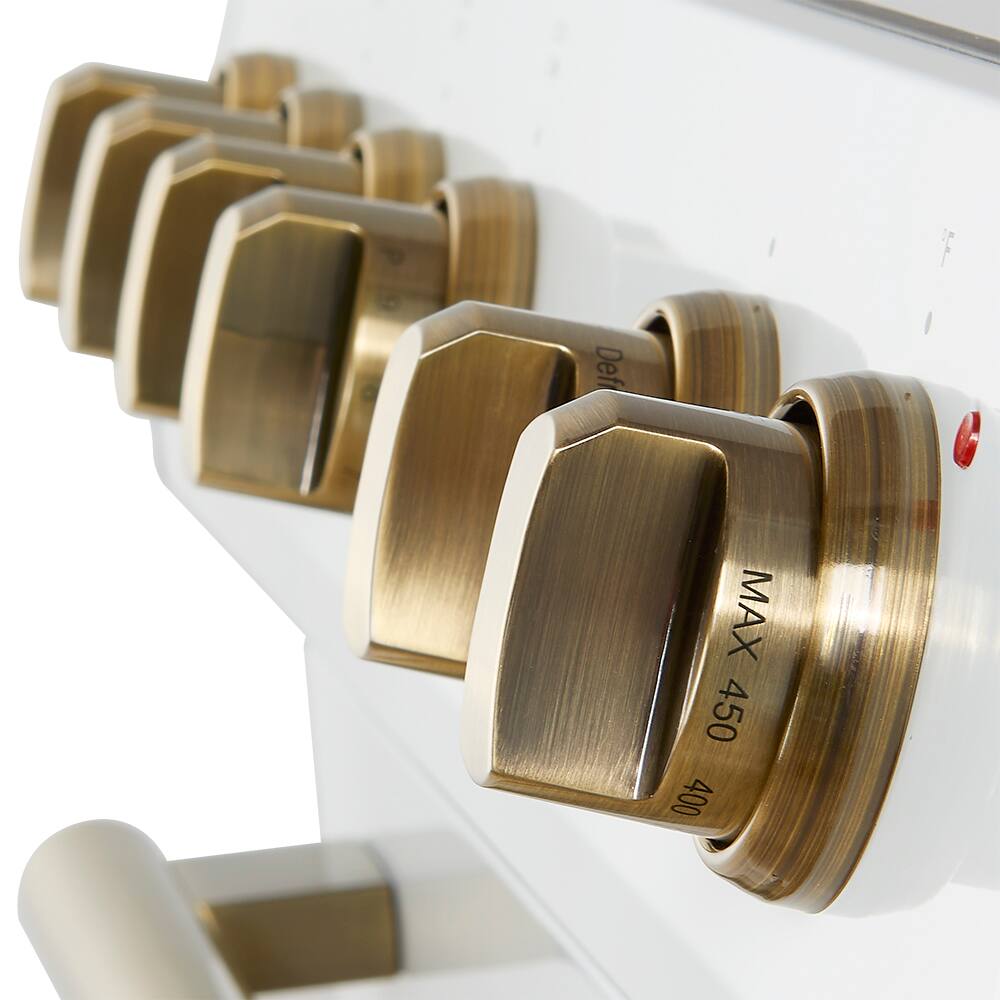 The text on the image reads "Def MAX 450 400." This suggests that the device is a stove or oven with a maximum temperature setting of 450 degrees. The knobs are gold, and there are five of them, indicating that the device has multiple temperature settings or functions.