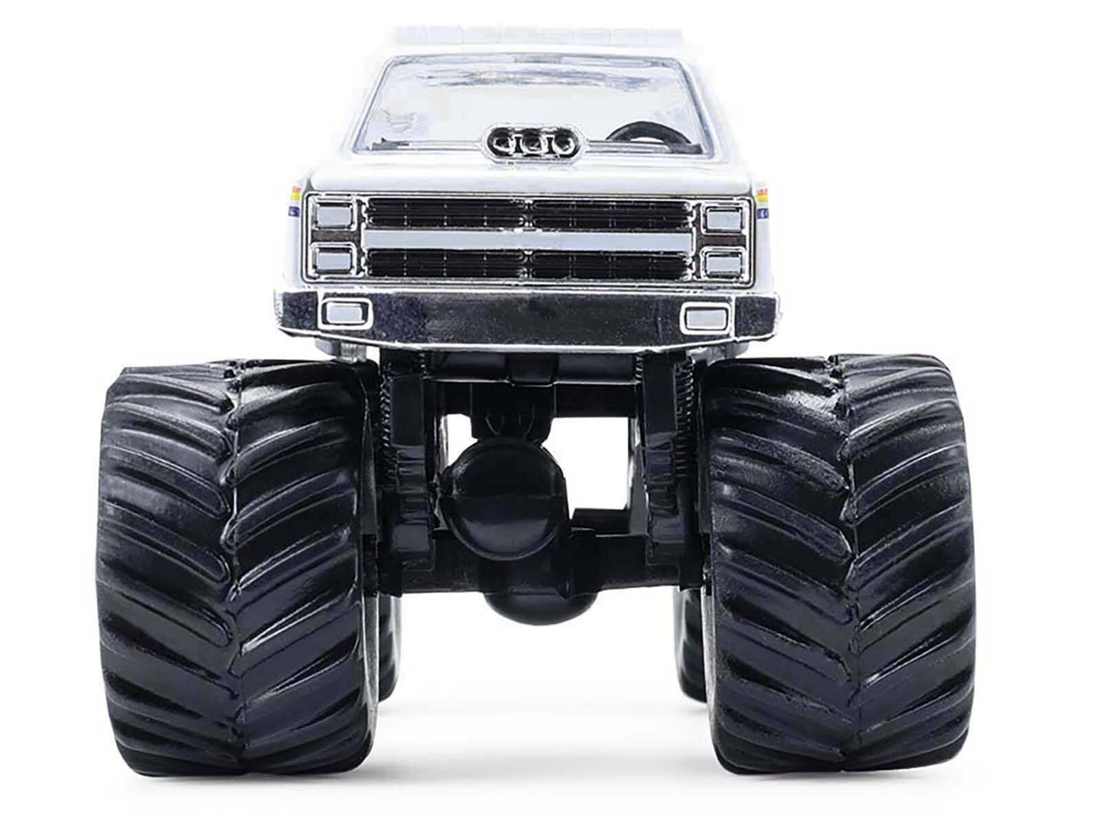 Alt View 4. Greenlight - 1986 Chevrolet Silverado Monster Truck Royal Canadian Mounted Police White w/Stripes 1/64 Scale Model Car by Greenlight.