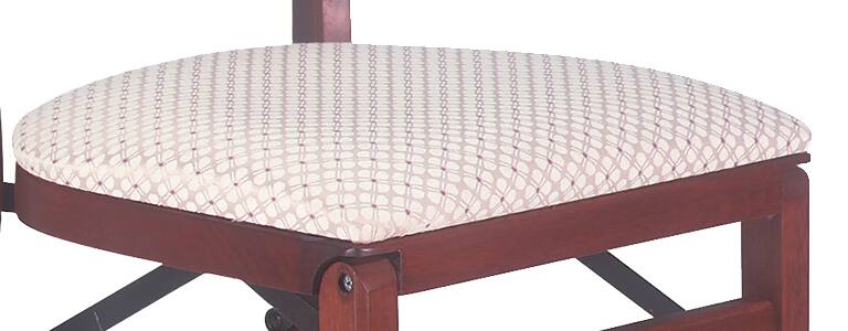 Angle. Stakmore - Stakmore French Upholstered Folding Chair, Cherry Frame with Blush Fabric - Cherry Finish.