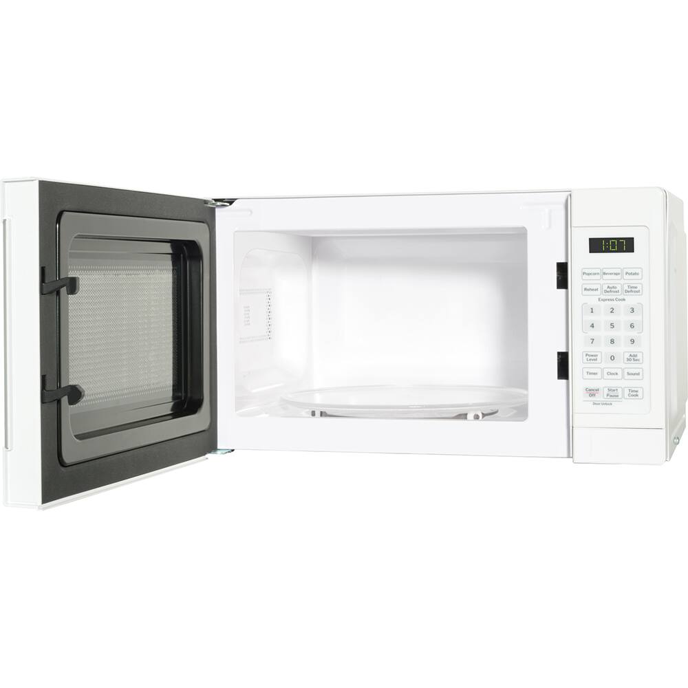 Alt View 1. GE - 0.7 Cu. Ft. 700-watt Countertop Microwave Oven, White + 2 Year Extended Warranty Protection Bundle - White.