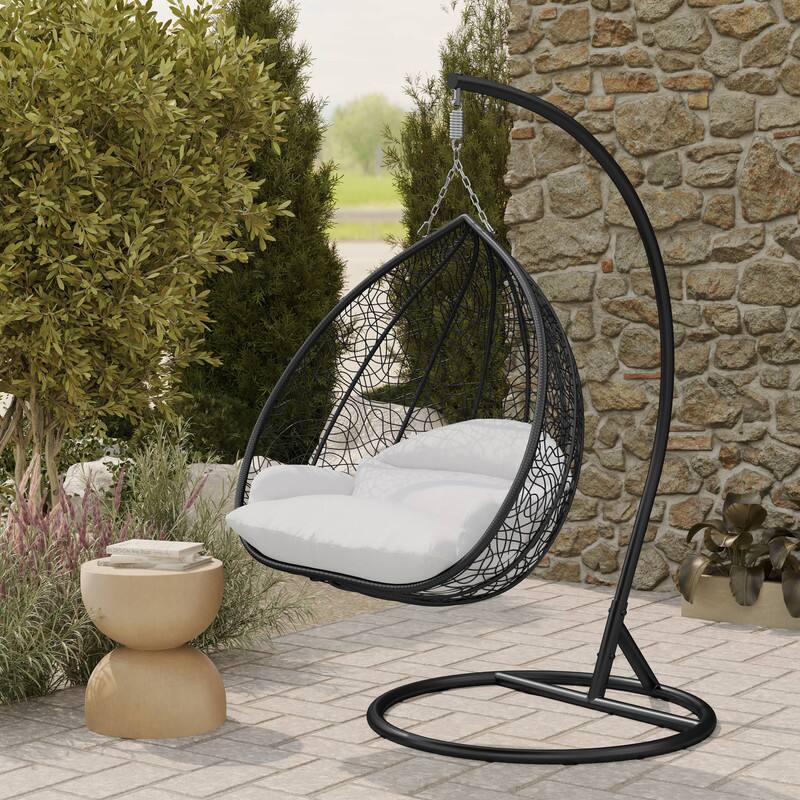 Left. LeisureMod - Recluse Modern Wicker Teardrop Hanging Egg Chair with Stand - Outdoor Indoor Swing Chair & Cushion - White.
