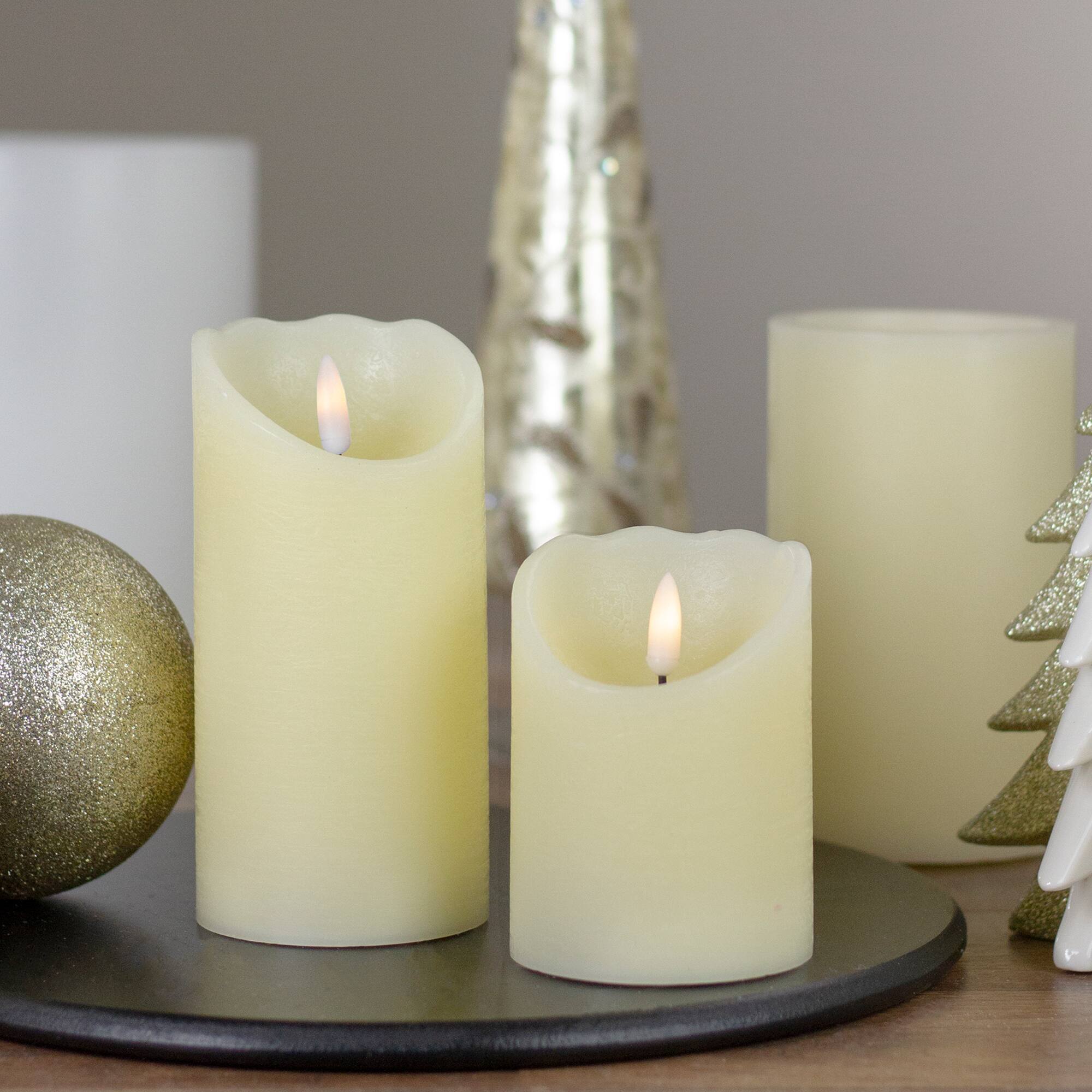 Alt View 1. Northlight - 4" Off White Flameless Battery Operated Flickering Wax LED Candle - Ivory.