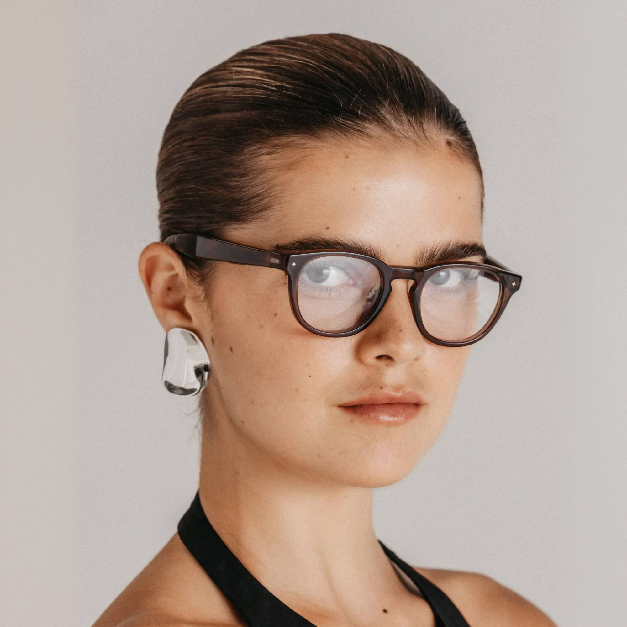 Left. VONDER - BASEL AI Smart Glasses that Translate, Call & Remember, 16h+ Battery, Premium Audio, Privacy-First, Clear Lenses - Whiskey.