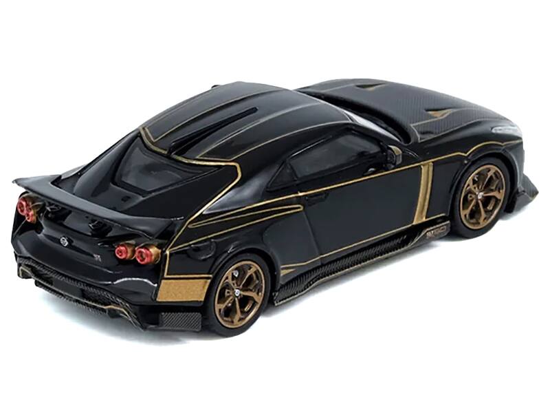 Angle. Inno Models - Nissan GT-R50 By ItalDesign Black with Gold Accents and Carbon Hood 1/64 Diecast Model Car by Inno Models - Black with Gold.