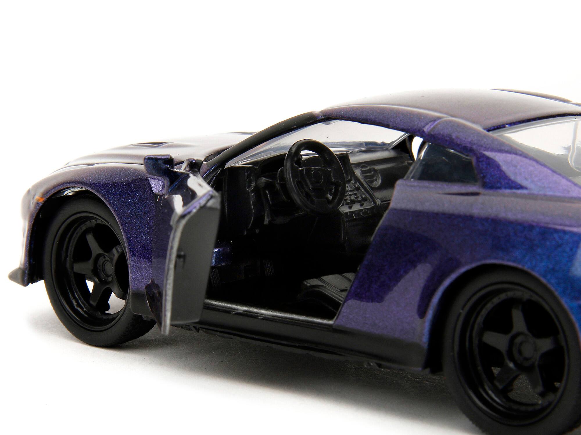 Left. Jada - 2009 Nissan GT-R (R35) Purple Metallic "Pink Slips" Series 1/32 Diecast Model Car by Jada - Purple Metallic.