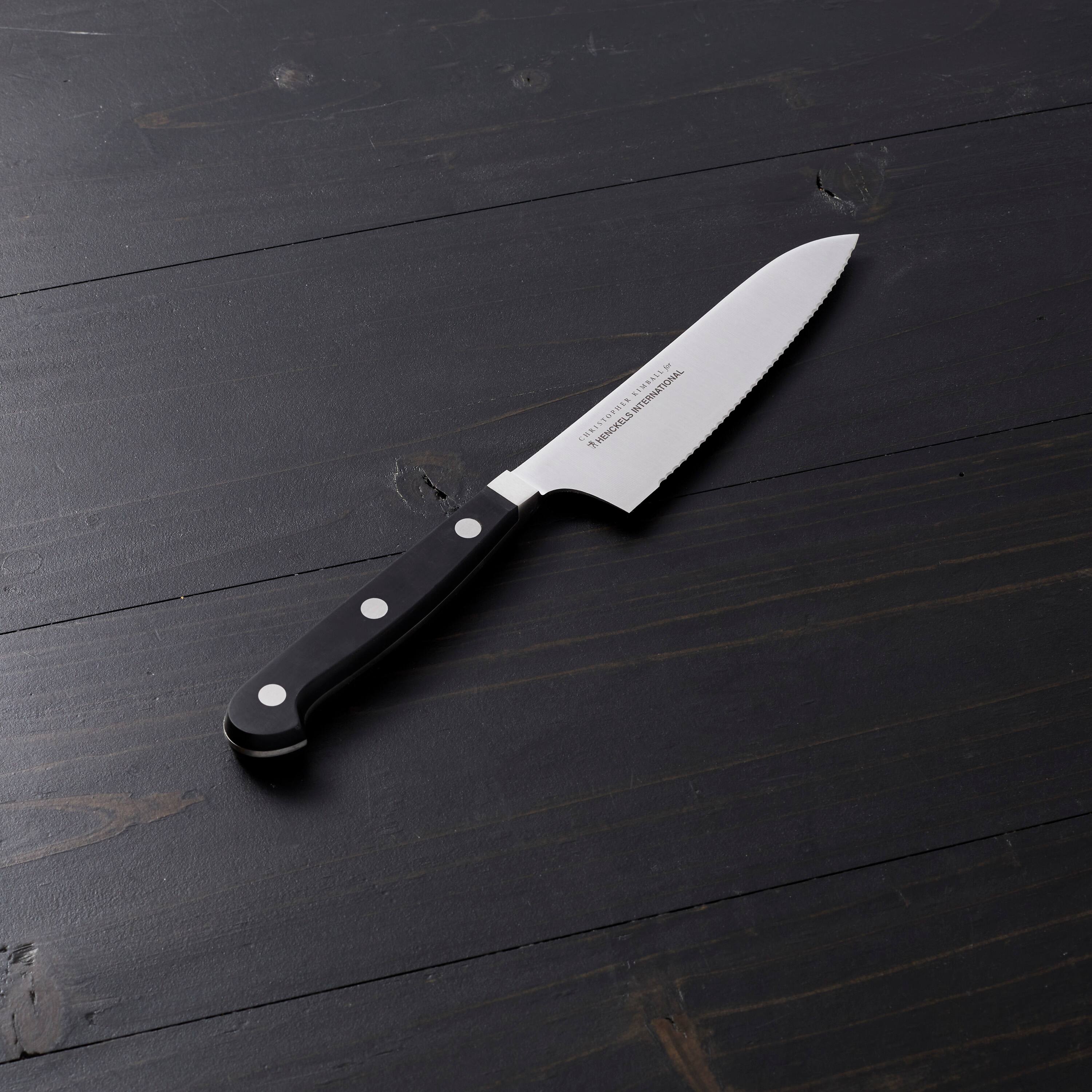 The text on the knife reads:

"CHRISTOPHER THENCKELS INTERNATIONAL"